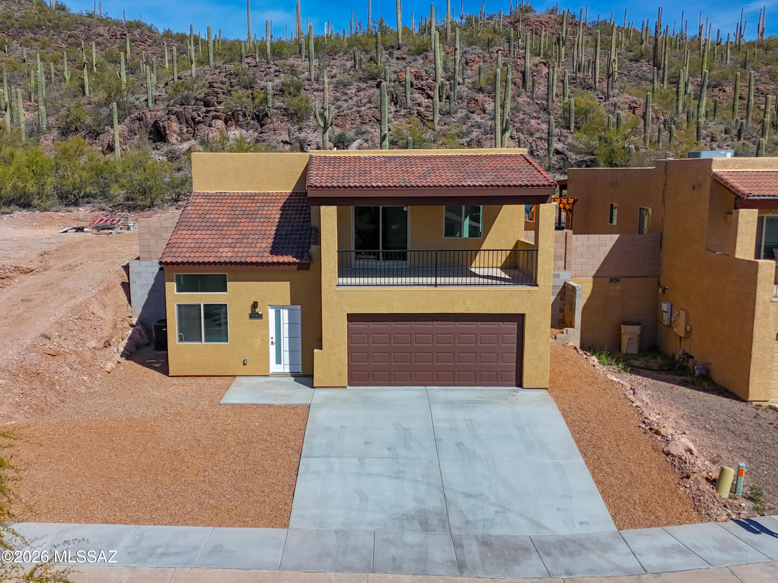 Brand new two-story home offering 3 bedrooms and 2 bathrooms with stunning mountain views. Enjoy expansive scenery from the large balcony, perfect for relaxing or entertaining. This newly built residence features a modern electric fireplace, brand new appliances, and a fresh, contemporary design throughout. Bright, open living spaces provide comfort and functionality, while quality finishes add style and appeal. Conveniently located just minutes from shopping centers, dining, and quick freeway access, this home combines peaceful views with everyday convenience. A perfect blend of new construction, comfort, and location--move-in ready and waiting to be enjoyed.