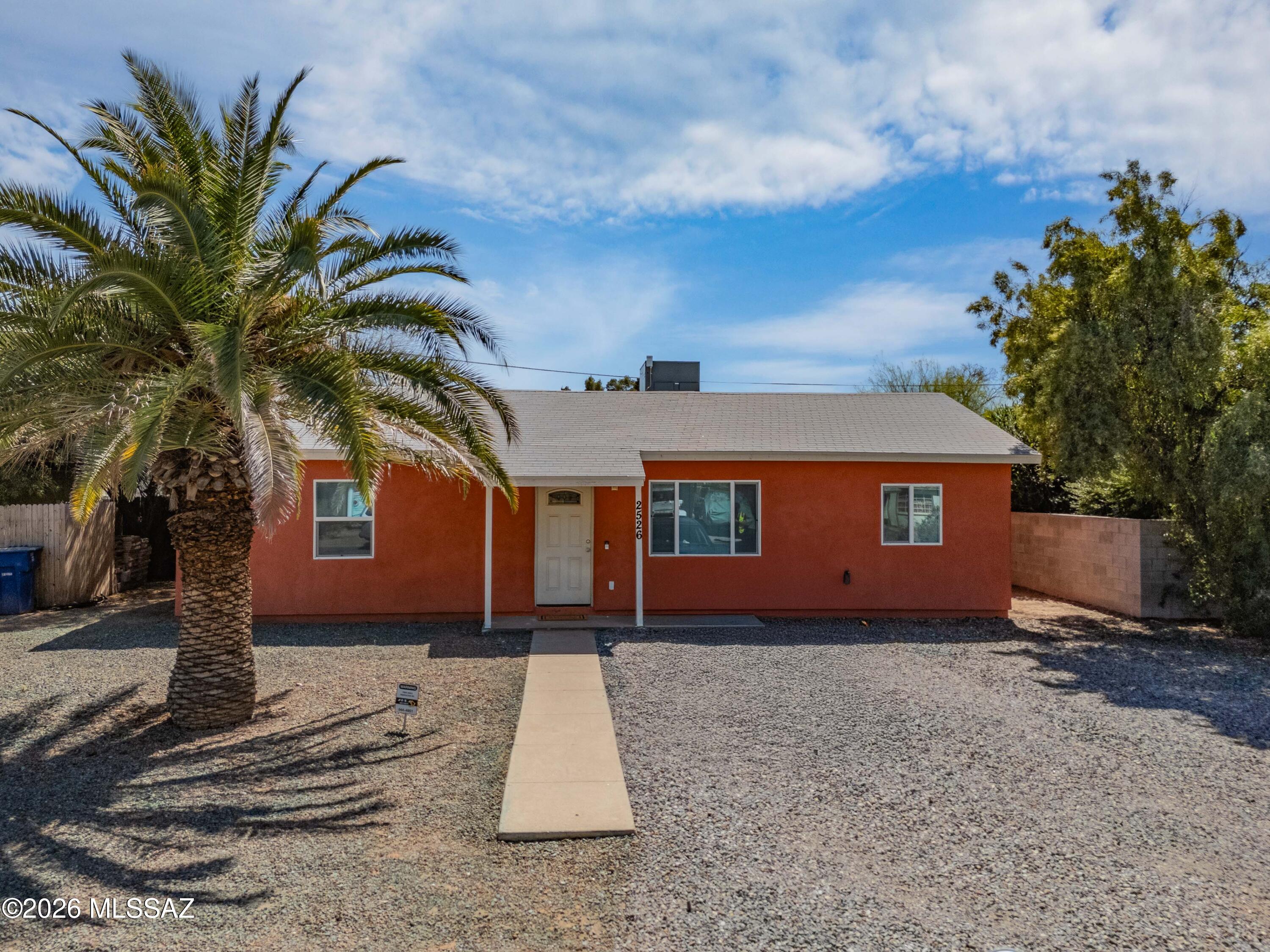 Prime University of Arizona Student Housing Investment - A Smart Way to Offset College Costs.
This pristine, fully renovated 5-bedroom, 3-bathroom home offers a rare turnkey opportunity for University of Arizona parents, investors, and students alike. Conveniently located within minutes from campus, and shopping, dining, and entertainment, this spacious property combines modern comfort with exceptional income potential.
The home welcomes you with ample on-site parking for 5 vehicles. Inside, you'll find a bright and open great room designed for both everyday living and entertaining. The spacious kitchen features updated cabinetry, granite countertops, stainless steel appliances, and a breakfast bar, seamlessly connecting the living and dining areas. While the open-concept layout creates an inviting communal space, the thoughtfully designed split floor plan provides privacy for each resident. All five generously sized bedrooms feature large closets, ceiling fans, and enough space for a queen bed, desk, and dresser. (Be sure to review the floor plan--you'll be impressed by the room sizes.)
The primary suite includes a walk-in closet and private bathroom with a jetted soaking tub. Bedrooms 2 and 3 are tucked away down a private hallway and share an updated bathroom with a walk-in shower. Bedrooms 4 and 5 share a third full bathroom with a tub/shower combination. All bathrooms have been tastefully renovated and offer ample vanity storage. An oversized laundry closet is equipped with a newer GE commercial-grade washer and dryer for added convenience.
Step outside to your private backyard retreat, designed for relaxation and low-maintenance living. The hardscaped yard features attractive concrete and paver surfaces complemented by artificial turf, creating a clean, functional outdoor space ideal for entertaining or unwinding.
For University of Arizona families, the investment opportunity is compelling: house your student in one bedroom and rent the remaining four. Strong rental income may help offset mortgage payments, utilities, and a significant portion of housing expenses while building long-term equity.
Whether you're seeking student housing, a high-demand rental property, or a strategic investment near campus, this move-in-ready home checks all the boxes. Opportunities like this are rare--schedule your showing today before it's gone.