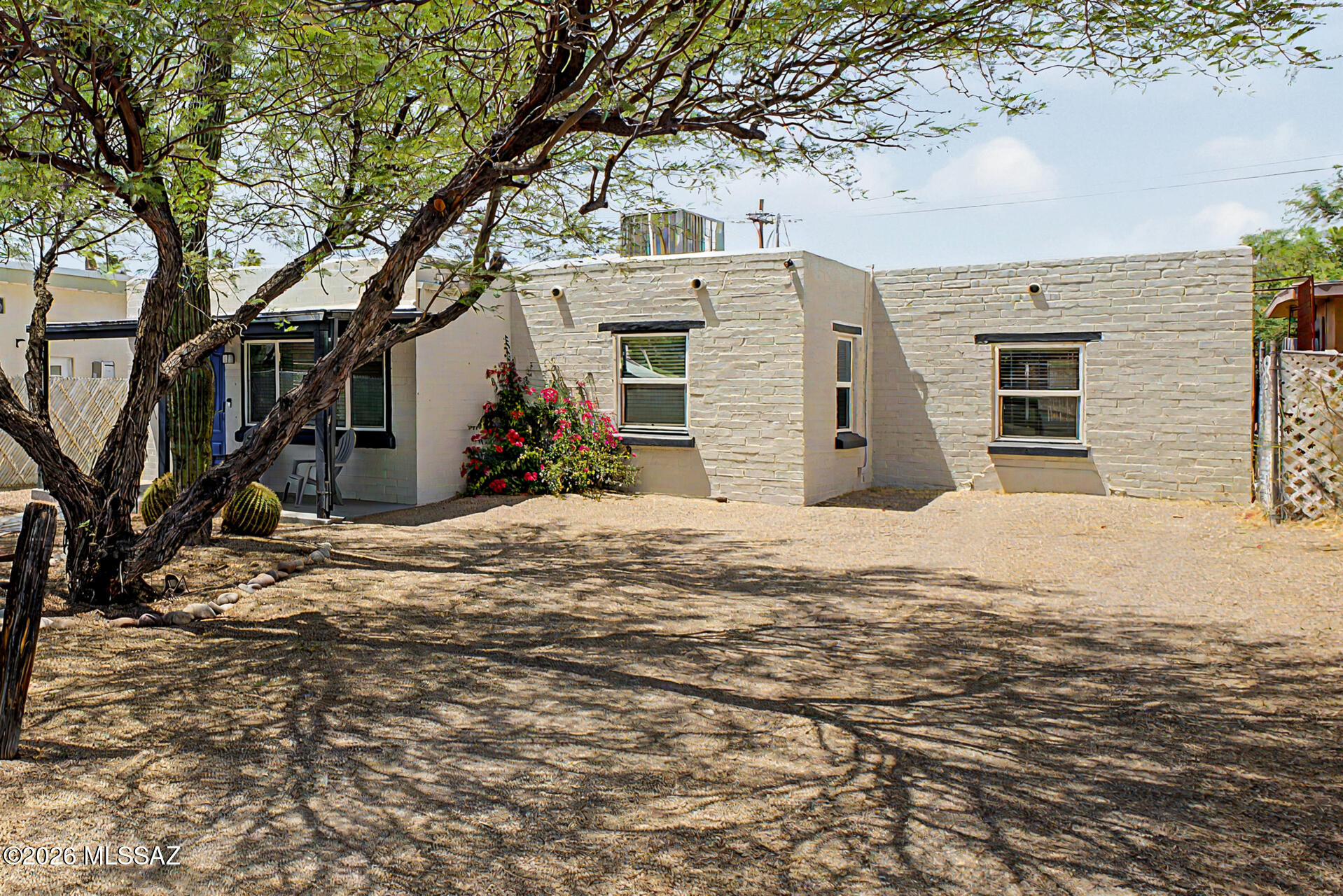 Historic charm meets modern living, and this one comes with a bonus. The main house offers 3 bedrooms & 2 baths with a beautifully remodeled kitchen, new roof, newer water heater, and updated HVAC-so all the big ticket items are already done. Original character preserved, modern comfort delivered. The guest house is the cherry on top - fully equipped with its own kitchen and bathroom, completely turnkey & ready to generate income from day one. Live in the main house and offset your mortgage with the guest house. Use both as short-term rentals. Or lock in a versatile property in one of Tucson's most character-rich neighborhoods. However you use it, this property works hard for you. Opportunities like this - historic bones, thoughtful updates, and built-in income potential don't last long! No HOA restrictions add additional flexibility for future use. A great opportunity to own in an in-demand rental and redevelopment areas.