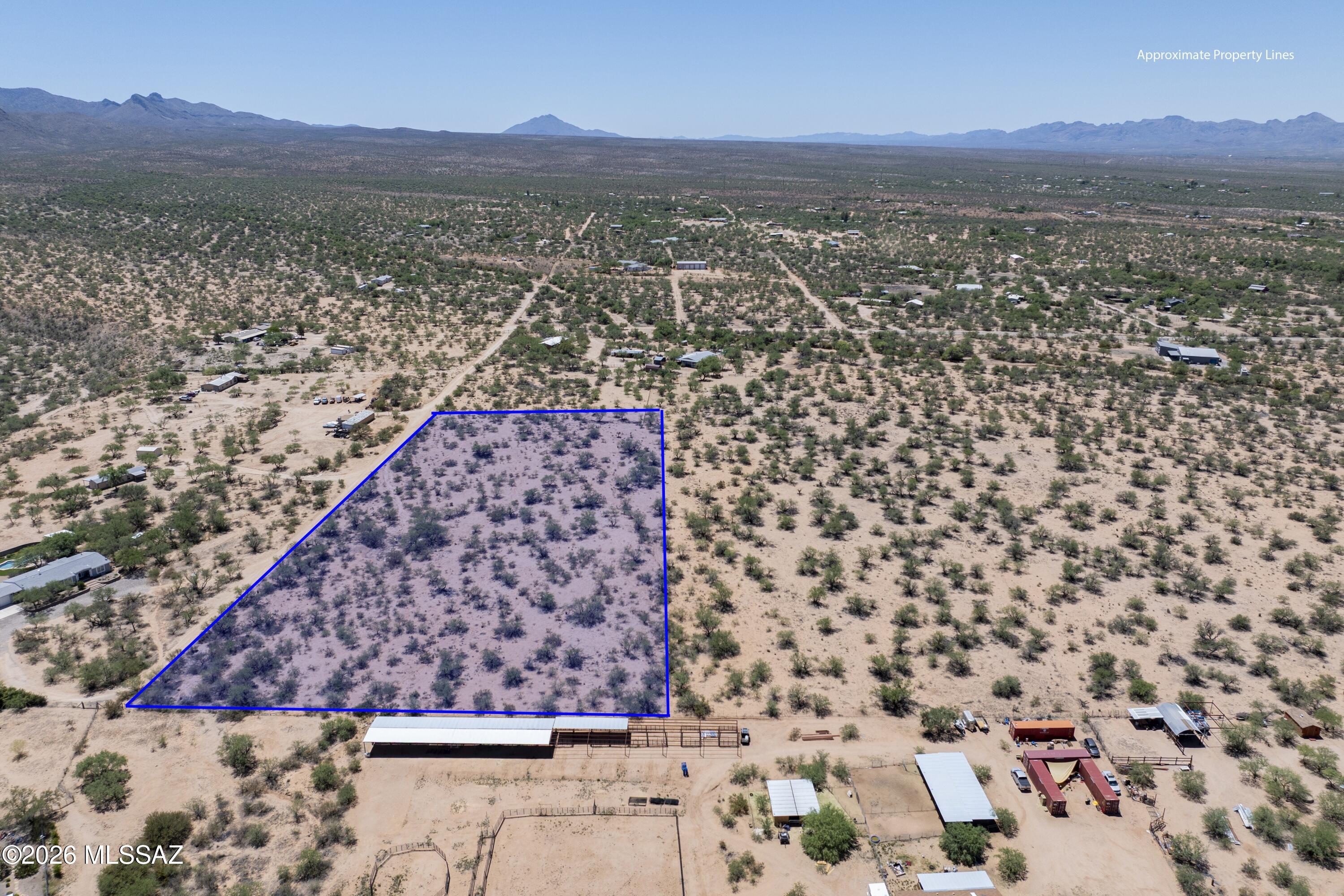Discover the beauty and tranquility of Southern Arizona with this rare 5-acre parcel in Elephant Head, to be split during escrow. Well water is available through a well share with only 1 other property. Nestled among rolling grasslands and mature mesquite trees, this property offers breathtaking mountain views, wide open skies, and endless possibilities. Build your dream home, create a private retreat, or invest in peaceful country living while still enjoying convenient access to I-19, Tubac, and Tucson. Enjoy stunning sunsets, star-filled nights, and the serenity of rural living with plenty of space for horses, gardens, or recreational use. A perfect blend of privacy and accessibility awaits!
