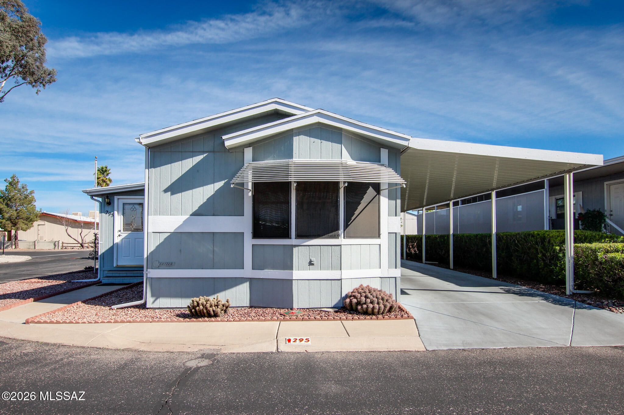 Welcome to Trails West Resort Park, a 55+ community with wonderful amenities to keep you active!  Pools, jacuzzies, shuffle board,  firepits, grills, fitness room, clubhouse, library, pool tables, and a dog park, Offering this 3 bedroom 2 bath home with Arizona Room, resting on a corner lot. Move-in-ready, home includes all the furnishings. This is a manufactured home park sale includes personal property only; land does not convey. Buyer must complete the community application process and receive corporate office approval prior to making an offer. Welcome Home!