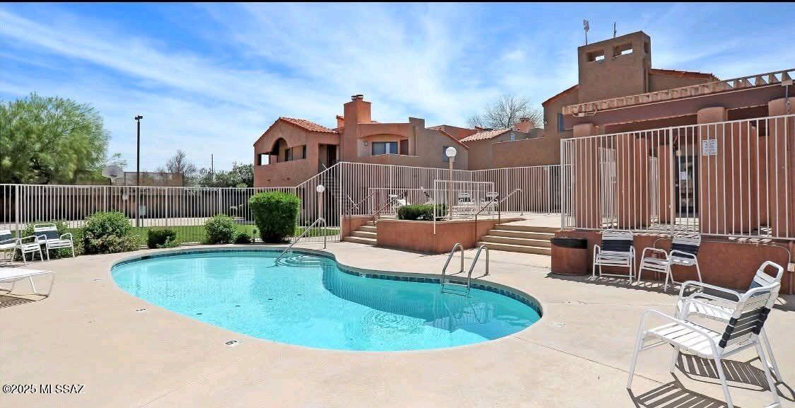 This well maintained 2-bedroom, 1-bathroom condo offers an unbeatable location just 2 miles from the University of Arizona near the corner of Campbell Avenue and Glenn Street. With easy access to the Sun Link streetcar, Cat Tran bus line, dining, shopping, parks, and I-10, convenience is at your doorstep. Located in the gated Copper Star Condominiums community, this unit features a patio, outdoor storage closet, and two assigned parking spaces--one covered and one uncovered. Inside, the open-concept living area offers updated laminate flooring, a cozy wood-burning fireplace, and abundant natural light. The kitchen includes ample cabinetry, a pantry, and a eat-in nook. The spacious primary living areas make this condo ideal for a primary residence, student housing, or investment opportunity Community amenities include a sparkling pool and spa, fitness center, basketball court, clubhouse with kitchen and fireplace, and on-site self-pay laundry. Monthly HOA dues include water, sewer, trash, and access to all community amenities.

Furnishings are available for purchase in a separate bill of sale.