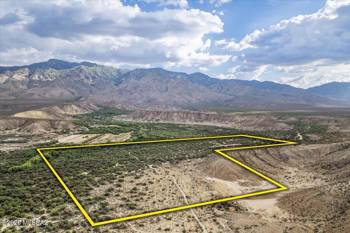 If you or your family are seeking a private, extravagant getaway near the stunning Mt. Graham, this could be your perfect retreat! The seller is offering two expansive parcels of land totaling 100 acres! The first parcel includes 40 acres with an unfinished tiny house, while the second adjacent parcel offers 60 acres. The seller has invested significantly in enhancing this land, exceeding typical standards to make it more convenient for future owners. Both parcels are being sold together, and Seller is open to a seller carry-back option if favorable terms can be arranged. Both parcels are available for a combined price of $975,000. This improved property offers:
- Water (1-inch meter connection with a pressure break and a backflow connector, leading into a 2-inch CPVC line. All connections made with lead-free brass).
- Electricity access (27 1/2 KVA Transformer) & (400 amp main)
- Two septic tanks with 3 leach lines (2,750 gal. total, capacity)
- Two Full RV hookups with (50 amp, 30 amp, RV breakers)
- Tiny House (Most of the materials needed to complete the project are already on site.)
- Private Easement with heavy-duty culvert & bridge system that supports heavy vehicles.

It's the perfect investment for those seeking privacy and a touch of off-grid living amid Arizona's stunning natural beauty, complete with varied elevation. Conveniently located near Cluff Ponds, this property makes an ideal retreat with breathtaking, up-close mountain views.
This acreage, with its established fundamentals, offers endless possibilities, allowing you to tailor it to your family's needs and make it truly your own! For more details, please contact us today, don't miss out on this unique opportunity!
* Please ensure you call before visiting the property. *