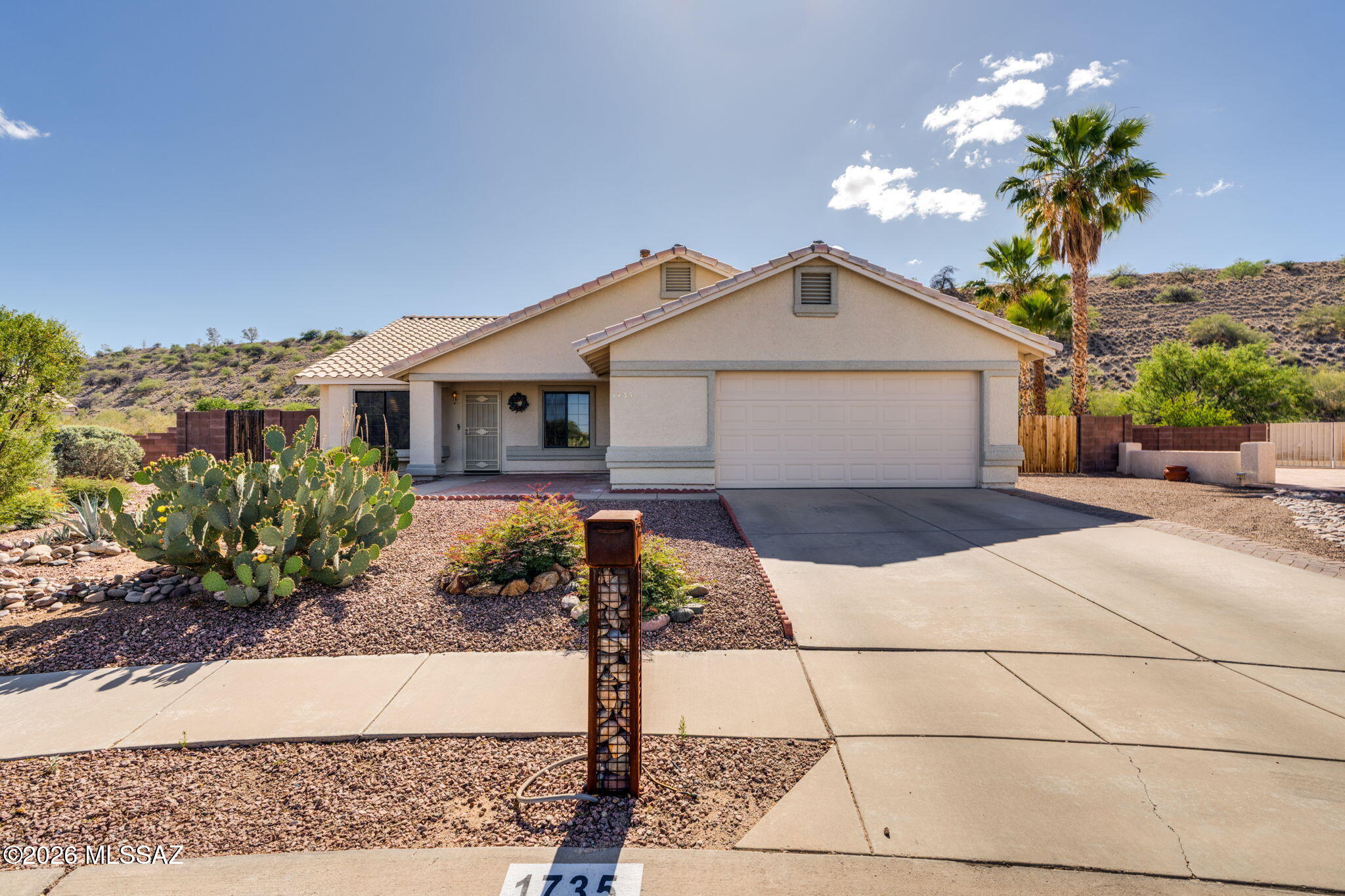 Welcome to your own private slice of Arizona living. Tucked away on an oversized lot with no rear neighbors, this beautifully maintained Sahuarita home offers the perfect mix of comfort, privacy, and resort-style outdoor living.

Step outside and you'll immediately see what makes this home special -- a sparkling pool, spacious covered patio, and wide-open backyard designed for relaxing evenings, entertaining guests, and enjoying Arizona's stunning sunsets and mountain views. With over 16,000 sq ft of lot space, there's room to spread out and enjoy the peaceful setting rarely found in neighborhood living.

Inside, the home features a bright and functional layout with generous living spaces, abundant natural light, and a seamless flow between the kitchen, dining, and living areas.... The kitchen offers ample cabinetry, prep space, and views into the backyard, making it ideal for everyday living and entertaining alike. The spacious primary suite provides a comfortable retreat, while additional bedrooms offer flexibility for guests, family, or a home office.

Whether you're hosting poolside gatherings, enjoying quiet mornings under the covered patio, or simply looking for more space and privacy, this home delivers the Arizona lifestyle buyers are searching for. Conveniently located near parks, shopping, dining, and everyday amenities while still offering a tucked-away feel.

Private lot. Pool. Mountain views. No rear neighbors. This is the one buyers wait for.