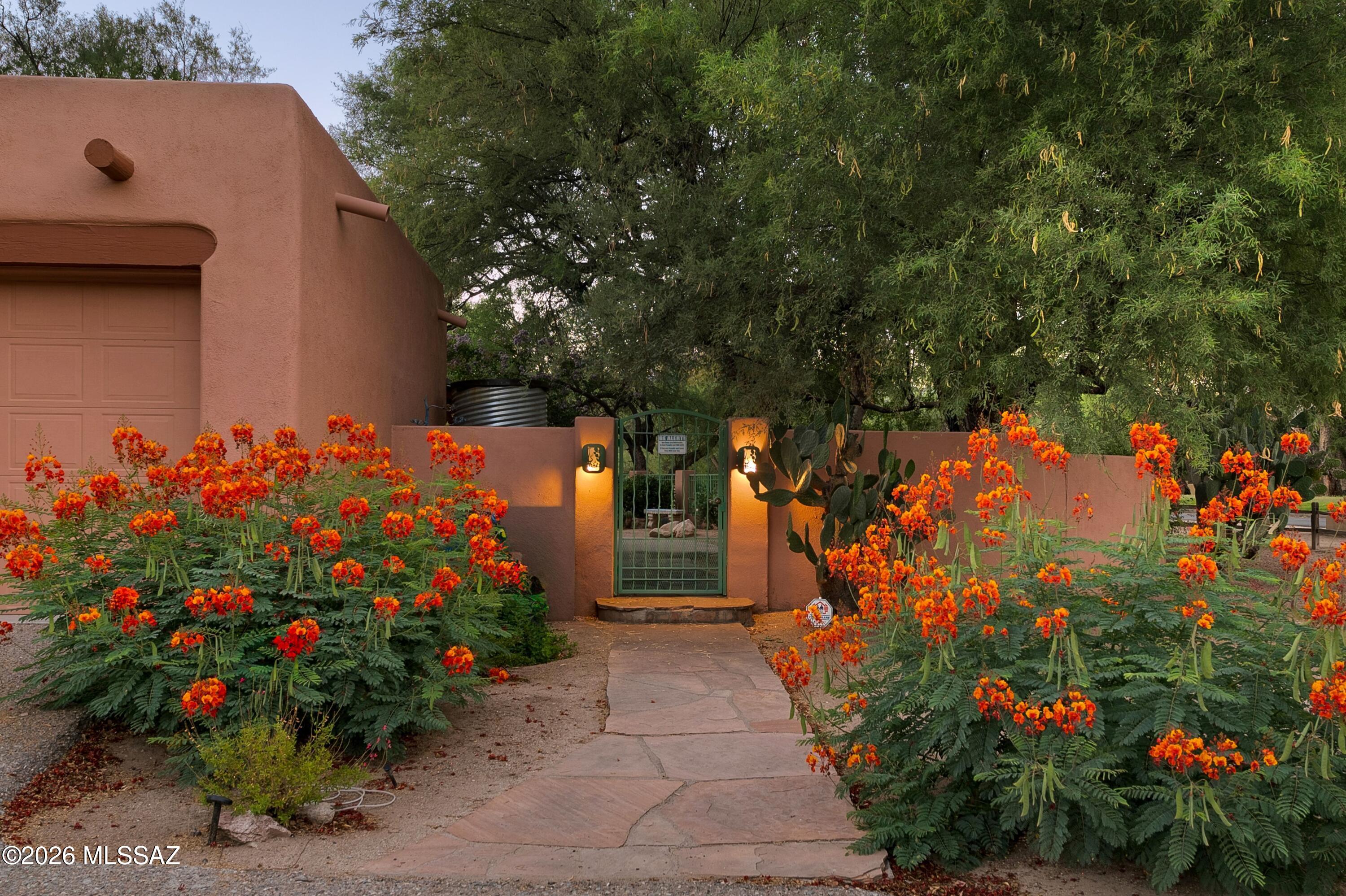 True southwest home with unmatched artistic flair! Corner lot home sits on the 8th tee box of 49ers golf course & is surrounded by mature shade trees. Original owner & current seller is a local well known pottery artistic, so this home is rich with color & unique custom touches! This energy efficient home is built using Ener-G  Block ICF insulated concrete forms offering R50 walls & R38 ceilings. From the circular driveway you are welcomed through a large front courtyard to the entry door. Inside find plenty of rooms for entertaining & hobbies with a full art studio, 4 bedrooms, a versatile heater and cooled Arizona room, generous kitchen & the coziest family room with a gas kiva fireplace. Back yard faces the golf course, has an extended covered patio & 3 large sheds. HOA is voluntary.