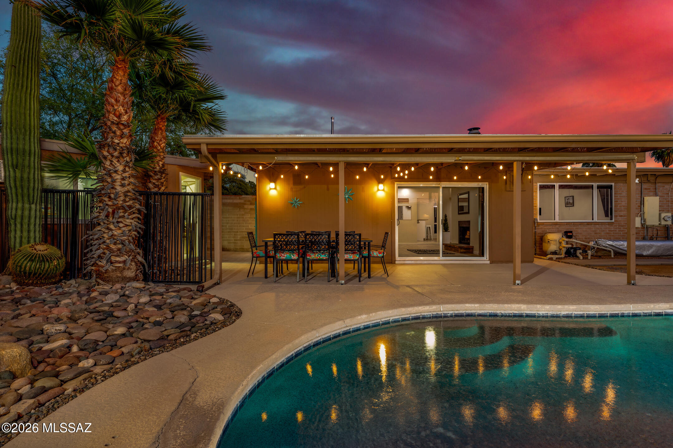 This thoughtfully improved home showcases years of intentional enhancements inside and out. From the moment you arrive, you'll appreciate the fresh exterior paint, low-maintenance desert landscaping, and added privacy of the block wall fencing.

Step inside to discover a fully updated interior featuring luxury vinyl plank flooring throughout, fresh interior paint, and upgraded lighting and ceiling fans that create a modern, cohesive feel. The versatile floor plan includes a converted fourth bedroom, offering flexibility for guests, a home office, hobby space, or additional living area. Double-pane vinyl windows and custom metal security screens provide both energy efficiency and peace of mind. At the heart of the home, the kitchen is ready for everyday living and entertaining with stainless steel appliances, ample counter space, and a breakfast bar. The adjoining family room features a cozy wood-burning fireplace, creating the perfect setting for relaxing evenings at home.

Major system improvements add long-term value, including a newer HVAC system with natural gas and central refrigeration (2023), roof refinishing, and a SpringWell salt-free water system. A detached casita with its own air conditioning provides exceptional versatility for guests, creative space, a home office, or private retreat.

Step outside to your backyard oasis, complete with a sparkling pool, covered patio with roll-down shades, and plenty of room to gather, relax, and entertain. The property includes a complete removable black rod pool safety fence with two gates. The pool equipment area features a dedicated backflow and drainage component as part of the pool system's design, allowing water to discharge properly when needed. The seller reports no known flooding concerns with the yard. Additional conveniences include a hot-water faucet at the carport and numerous thoughtful touches throughout the property.

Combining comfort, functionality, versatility, and meaningful upgrades, this home is ready to welcome its next owner.

Your next chapter starts here!