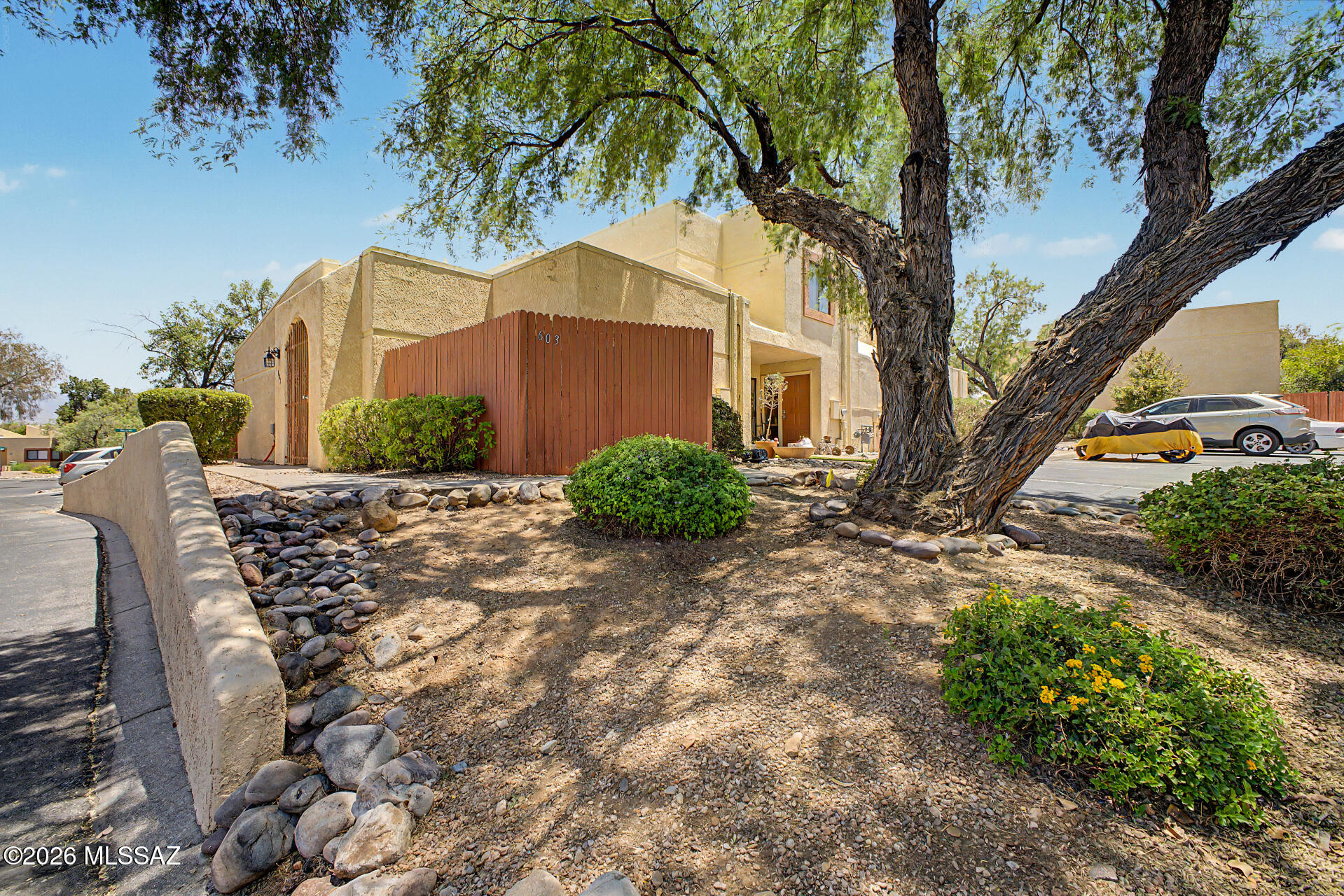 This updated townhome offers a rare opportunity in Kenyon Terrace! Unique end unit is steps from the pool area, with TWO patios, two assigned parking spaces, large living/dining area, island kitchen and more. Newer flooring, paint, cabinets, and Samsung appliances; including high-end refrigerator and built-in microwave. Bedroom has walk-in closet and its own patio. Newer vanity, sink and toilet in bathroom. Laundry closet conveniently located inside. Ample storage inside and out. Low maintenance living awaits in this conveniently located east side home!
