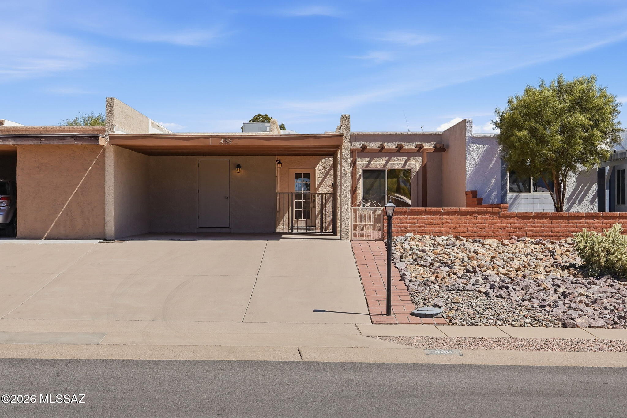Welcome to this beautiful, well-maintained two bedroom/two bathroom townhome in the desirable Villages of Green Valley neighborhood. Enjoy breathtaking views of the mountains from the front patio and stunning natural desert views from the back patio. This well designed, sun-drenched home maximizes space and storage; blending everyday comfort with effortless, low-maintenance living. The clubhouse is a short five minute walk away, with many amenities including a pool, spa, pickleball courts and more. Enjoy being conveniently located to many stores, restaurants and local entertainment. This home is a must see!