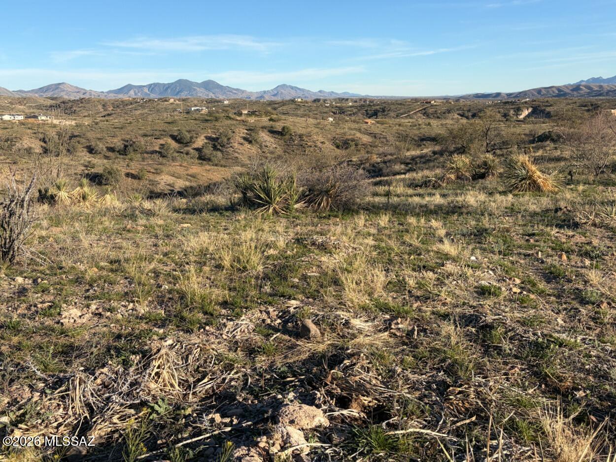 Southeast Rio Rico highland vacant land lot now available, 0.66 acres. Great views on a quiet road. Build your custom home and off your porch enjoy amazing sunrise/sunsets found only in Rio Rio!

( Seller had Flag/Stake service done 2-24-26.)
( Buyer had Perc Test done 4-24-26 failed.)