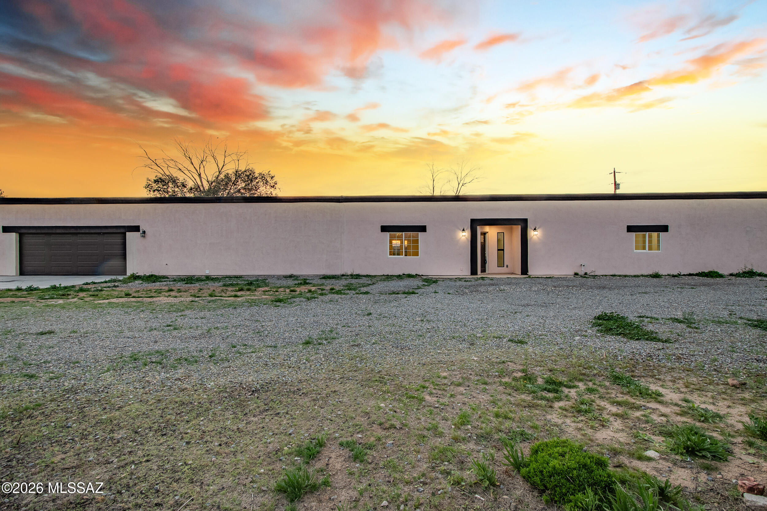 Fully remodeled remodeled and move-in ready, this beautifully updated home sits on a rare full acre in the heart of Marana—the only property of its kind under $500K offering true mixed-use zoning within the city center.

The home features a clean, modern exterior, refreshed finishes throughout, and a functional layout ideal for comfortable living. The expansive 1-acre lot provides endless flexibility—perfect for horses, trucks, heavy equipment, materials, business use, or future structures. With wide-open space surrounding the home, you'll enjoy privacy and room to grow while staying just minutes from all major Marana amenities, I-10 access, shopping, and dining.