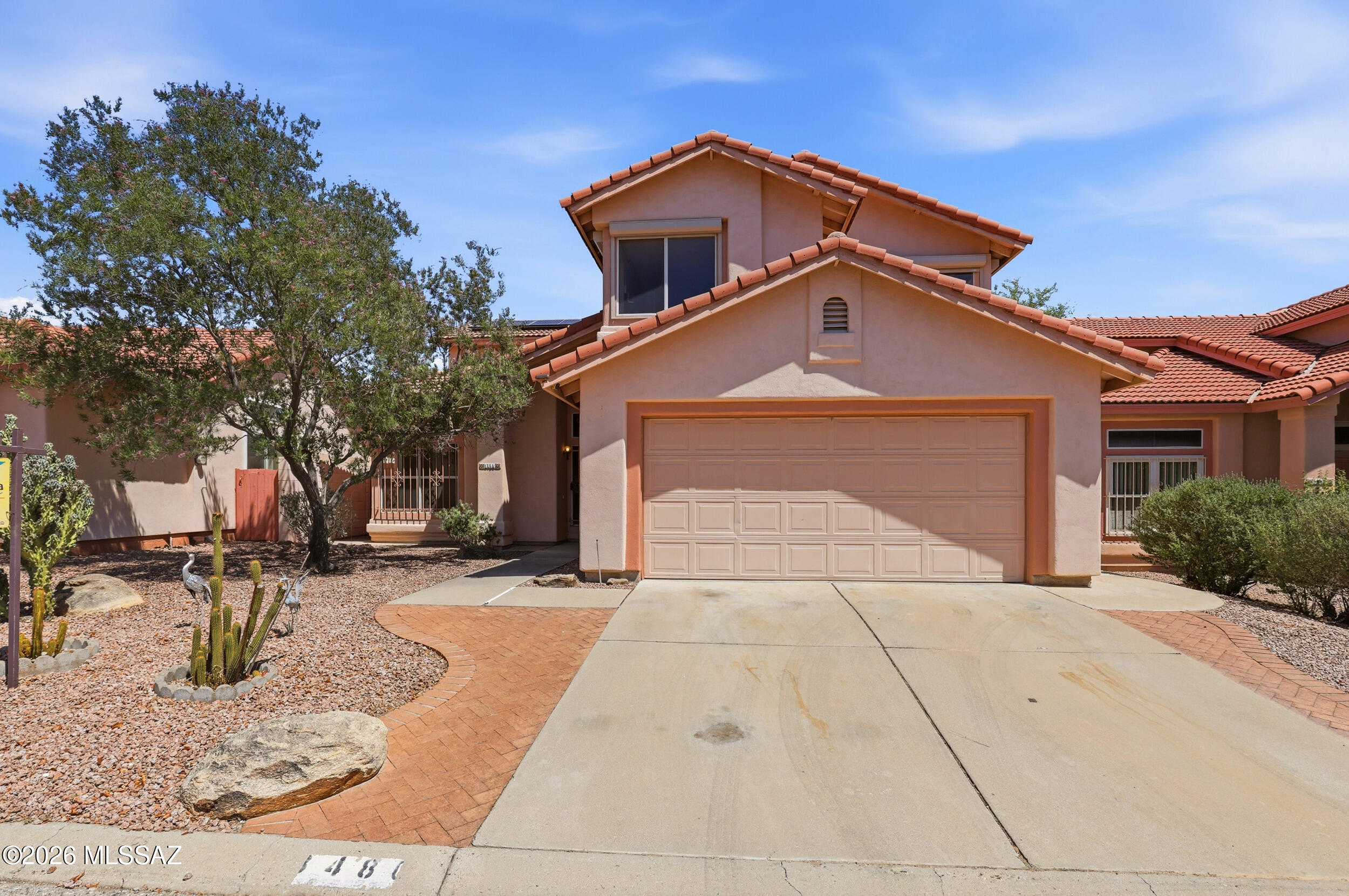 Welcome to visit this well maintained Home with 4 BR/3 BA in North Ranch. Soaring ceilings, Spacious living room with the dinning area.  French door to patio, and ceiling fans. Fantastic eat-in kitchen features stylish counters, breakfast bar, bay window in breakfast nook, SS appliances, and wood cabinets. Cozy fireplace in family room w/decorative security doors & bars throughout. Generous size bedrooms, ample closets, and 2.5 baths. Breathtaking Mountain Views, large backyard patio. Home located close to community pool.  Electric rolling shutter for most of rooms for the energy efficiency. Leased Solar panel with monthly fee $113 which will save your energy bills.  Water softer system installed.  A must see.