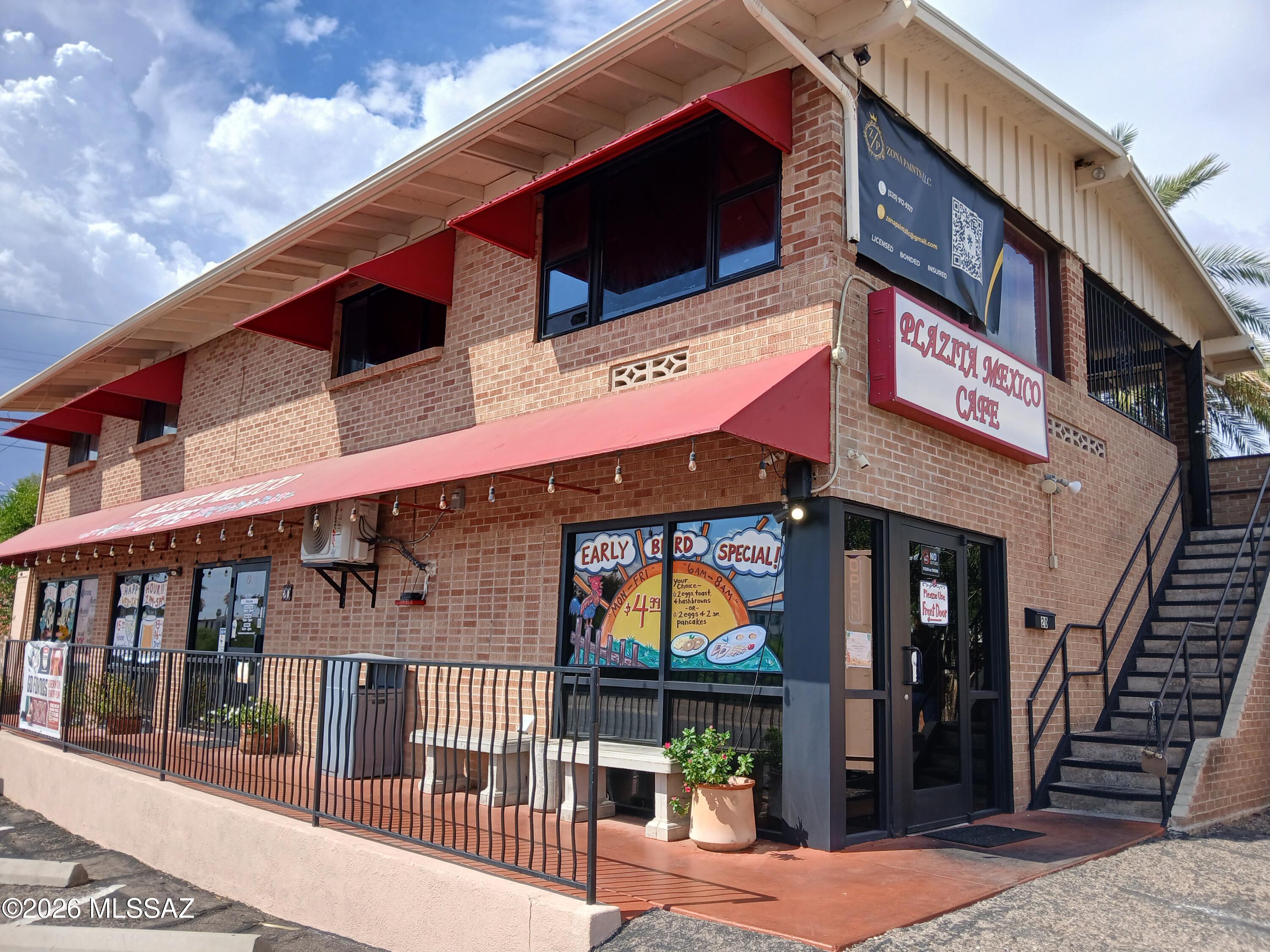 Rare Tucson find! Unique 2-story property built of quality red brick construction. Upper level is a 4 Bedroom, Den/Office, 1 Bathroom and the lower level is a thriving Authentic Mexican food restaurant.