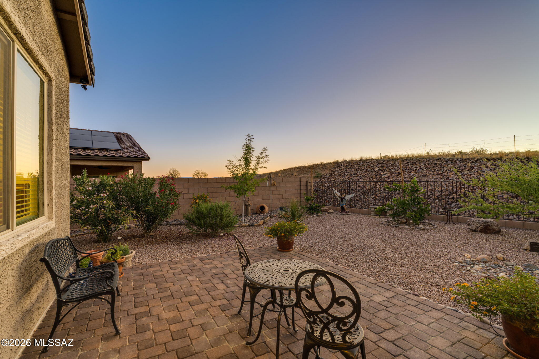 Enjoy stunning Santa Rita Mountain views from this 4-bedroom, 2-bath home in desirable Santa Rita Ranch III in Corona de Tucson. Backing to open desert with view fencing, this property offers privacy and breathtaking scenery with no rear neighbors. The open floor plan features a spacious great room that flows seamlessly into the kitchen, creating the perfect space for everyday living and entertaining. The split-bedroom design provides privacy, with a comfortable primary suite to unwind at the end of the day. Relax on the covered patio while taking in spectacular mountain views, Arizona sunrises, and the peaceful desert landscape. Conveniently located in the Vail School District near, schools, parks, walking trails, and easy access to I-10. Call today for your private showing!