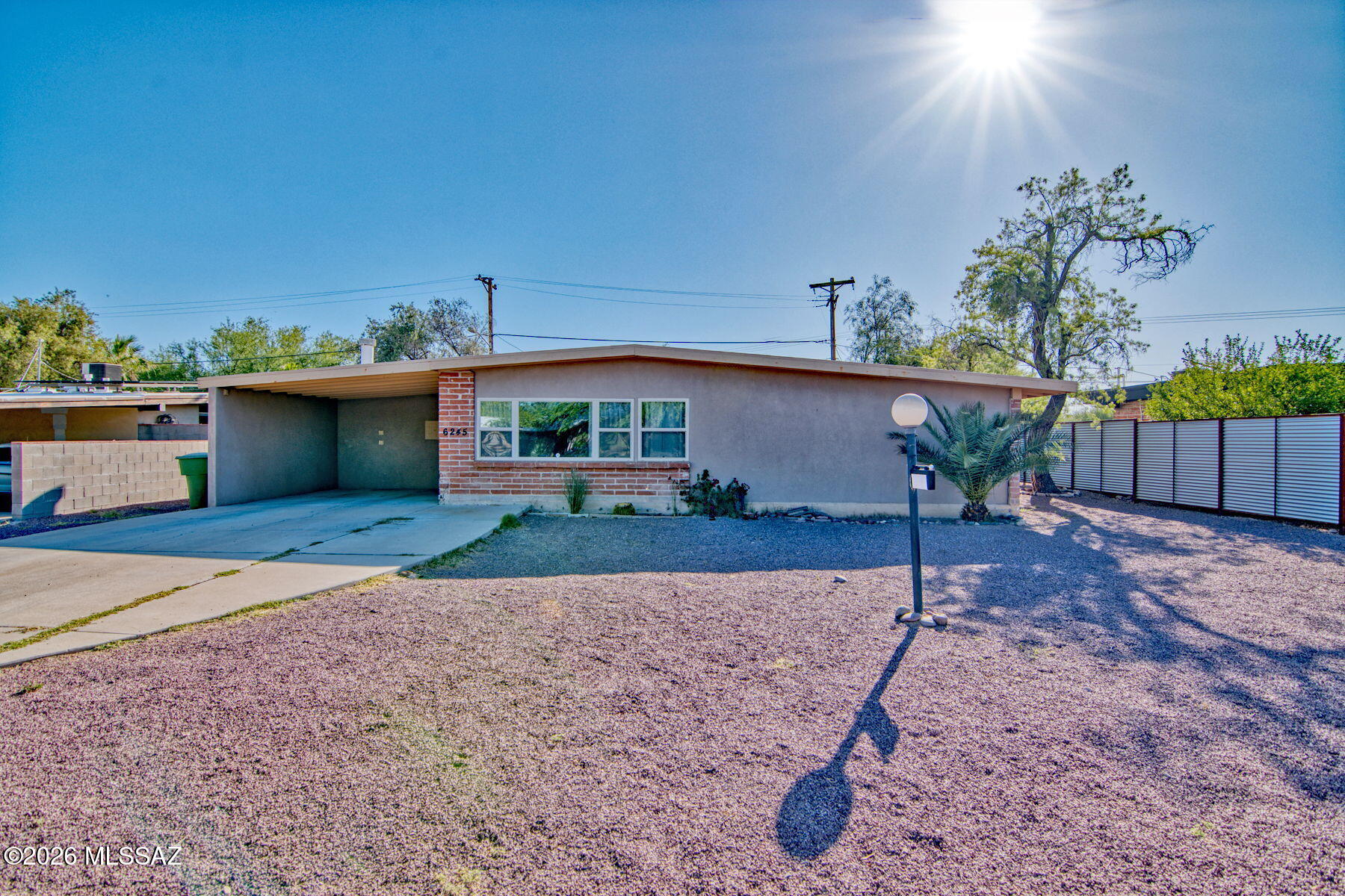 Welcome to prime central Tucson living! Located in Rose Hill Estates, this charming 4-bedroom, 2-bathroom mid-century home perfectly blends timeless character with modern peace of mind. Exceptional updates include a recently recoated roof, updated plumbing, fresh paint, and a repaired pool motor. Inside, enjoy bright skylights, tile flooring, and a cozy fireplace. Step into your private backyard oasis featuring a sparkling pool, covered patio, and workshop. Unbeatable central location just minutes to TMC, Costco, Target, dining, and schools. This property offers a fantastic combination of central convenience and lifestyle. Do not miss this mid-century gem!