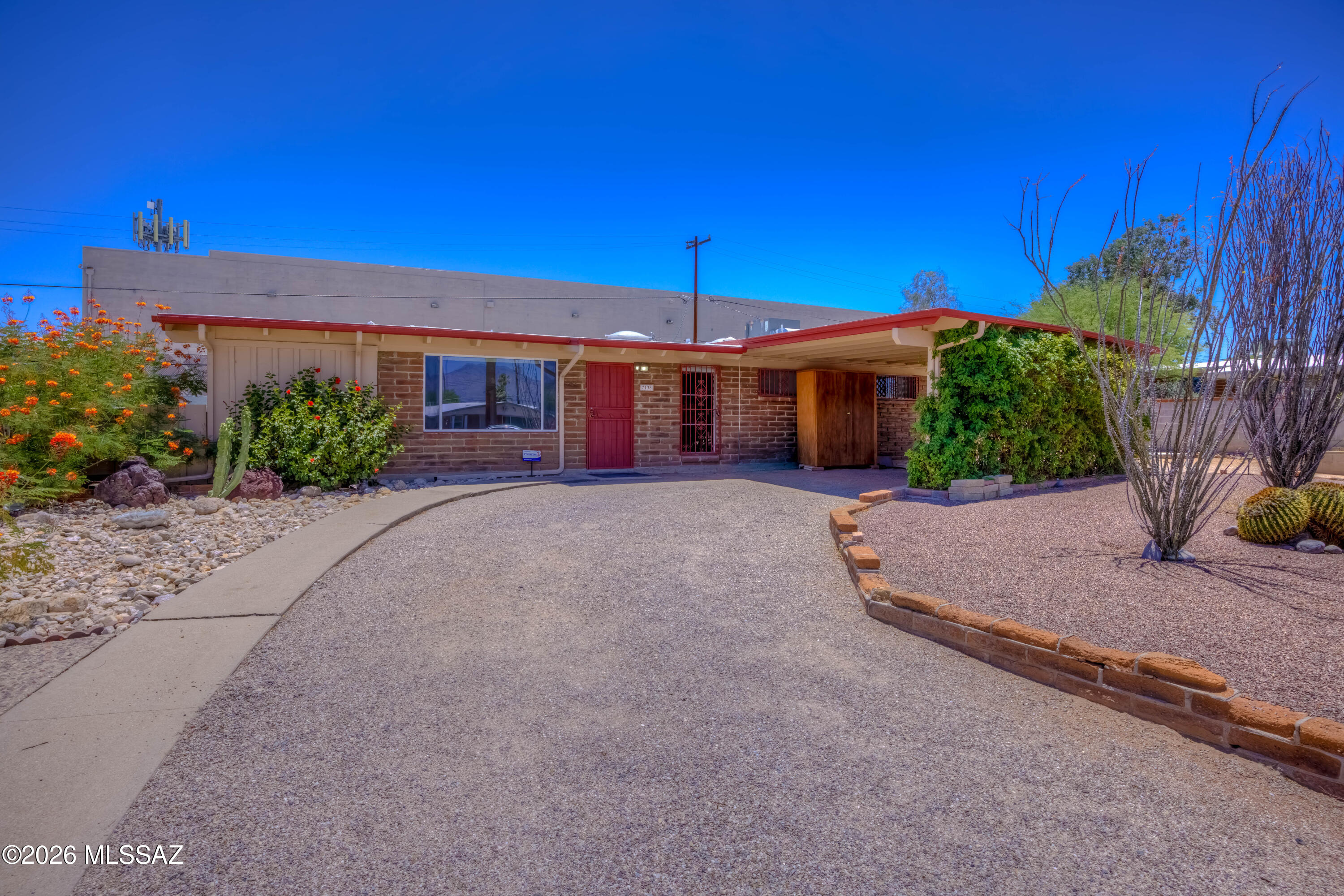 Charming 3 bedroom, 2 and half bath with den/office in East Tucson. Updated kitchen has granite countertops, white cabinets, large sink, and newer appliances. Master bedroom has walk in tub/jacuzzi. Separate office with bookcases that could be fourth bedroom. Lots of tile and inside storage, vaulted ceilings, fans throughout, bathrooms have been updated, easy care yard with saguaro, shrubs and desert plantings. Mountain View outside the large north facing living room window. The large outside workshop has power. Close to shopping, restaurants, and entertainment complete this move in ready residence.