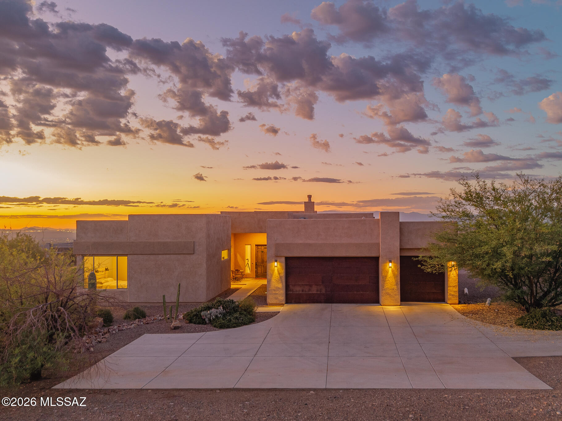 Experience luxury desert living in this beautifully upgraded home showcasing breathtaking mountain and sparkling city views. Soaring vaulted ceilings and an open, light-filled floor plan create an inviting yet sophisticated atmosphere. Thoughtful upgrades throughout blend timeless style with modern comfort. The exceptional backyard is the true highlight, offering a private retreat designed to capture Arizona's stunning sunsets, panoramic mountain vistas, and twinkling city lights--perfect for relaxing or entertaining. A rare opportunity to own a home where luxury, privacy, and unforgettable views come together.
