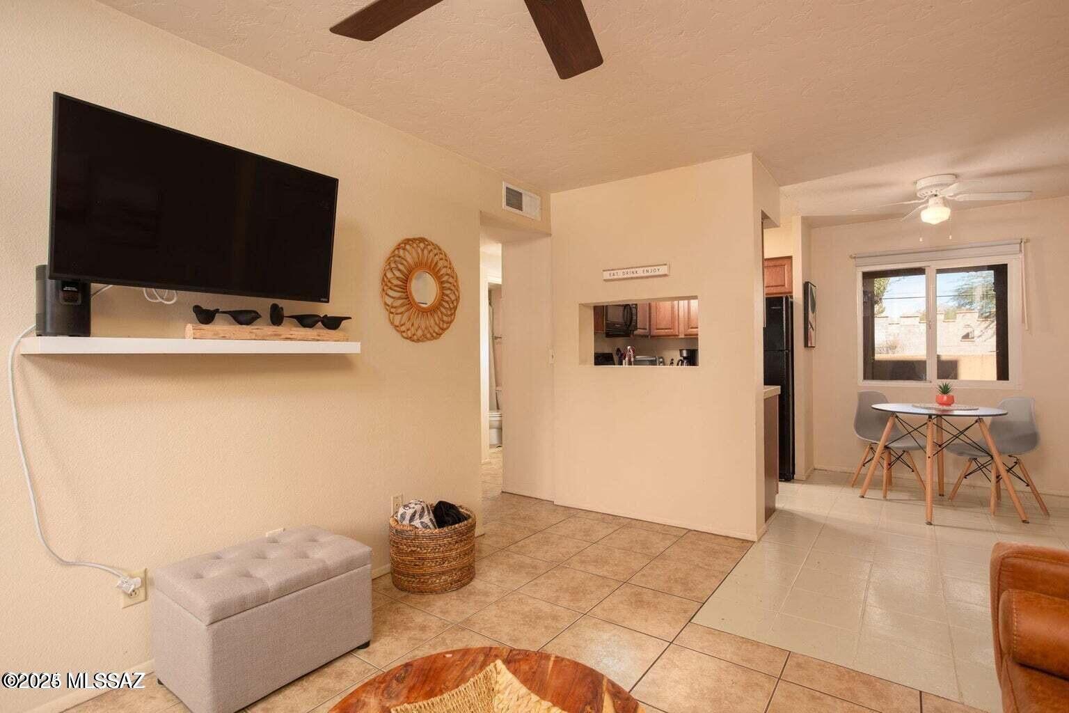 Ground-floor condo at Casa Club Condominiums! This well-located unit at 1810 E Blacklidge Dr #106 offers easy, stair-free living with a functional layout designed for comfort and convenience. The open living area is filled with natural light and flows effortlessly into the dining space and kitchen, making it ideal for everyday living or low-maintenance ownership.

The ground-level location provides added accessibility and privacy, while allowing quick access to the community's amenities. Casa Club Condominiums is known for its lush grounds and resort-style pool, creating a relaxed atmosphere just minutes from the University of Arizona, Banner Medical Center, downtown Tucson, and major commuter routes.
Looking for a primary residence, winter retreat, or investment, this has it all.