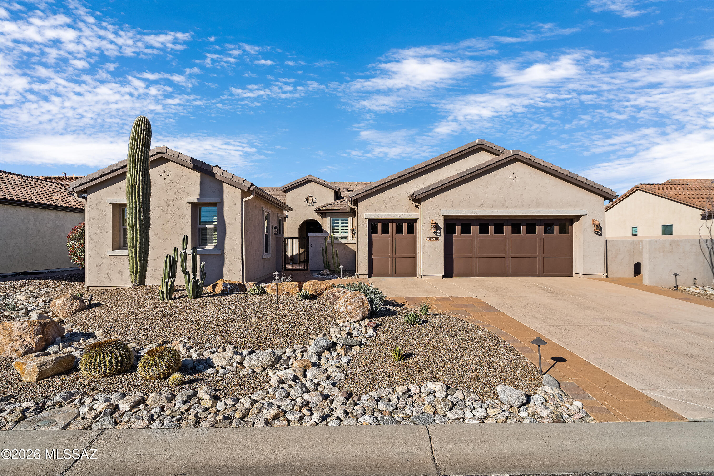 Perfectly positioned on the 13th fairway of the SaddleBrooke Ranch Golf Club, this exceptional Covina floor plan offers refined desert living with breathtaking golf course views in one of Oracle, Arizona's most sought-after 55+ gated communities. Designed for both elegance and comfort, the home features a private casita ideal for guests, along with striking architectural details including graceful arched headers that add timeless character throughout. The heart of the home is the beautifully upgraded kitchen, showcasing stainless steel appliances, abundant cabinetry, and a seamless flow into the main living areas—perfect for everyday living and entertaining. Expansive windows frame serene fairway views, while the extended back patio creates an inviting outdoor retreat for relaxing sunset , dining al fresco, or hosting friends against the backdrop of the course.
SaddleBrooke Ranch offers an unparalleled resort-style lifestyle with championship golf, tennis, pickleball, swimming, fitness centers, clubs, and endless social opportunitiesall set amid stunning desert landscapes and mountain vistas. This is luxury, lifestyle, and locationperfectly combined.