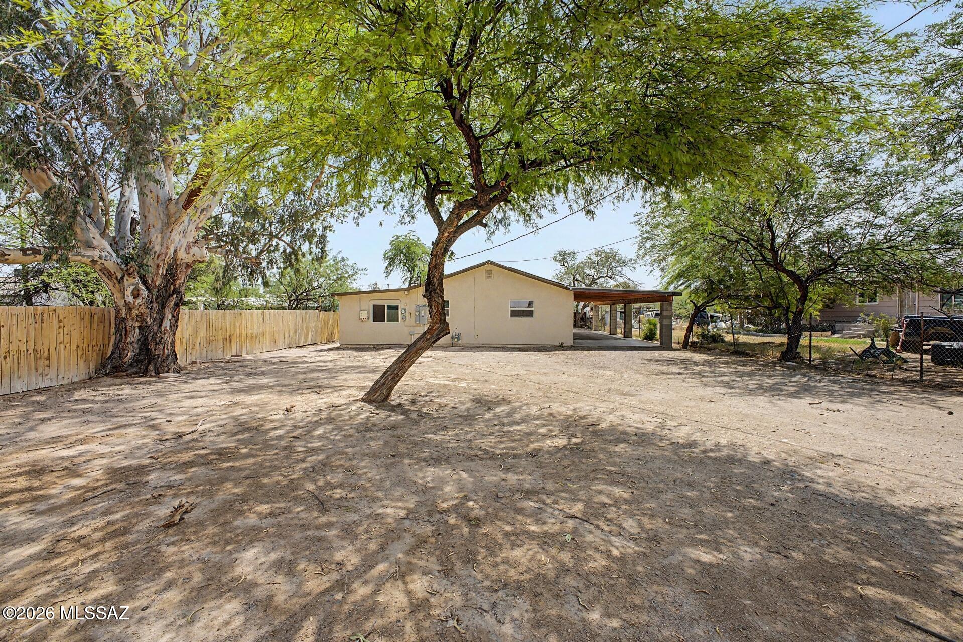 0% down financing options available for qualified buyers! Tucked away on a spacious lot, this property offers privacy, flexibility, and endless potential. Inside, you'll find  a refreshed kitchen, generously sized living areas, and a spacious primary suite with an updated walk-in shower. The expansive lot offers additional storage buildings and tons of potential for RV parking, recreational toys, or future improvements. Whether you're looking for extra space or a property you can make your own over time, this hidden gem is full of opportunity.