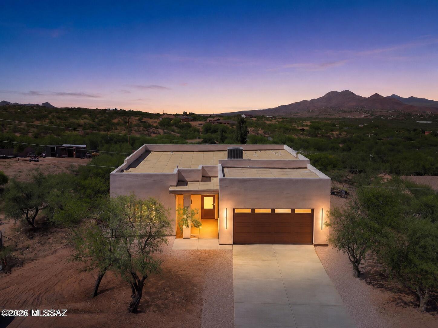 This is not your typical new construction home in Rio Rico. Thoughtfully designed with elevated finishes, exceptional craftsmanship, and attention to detail rarely found at this price point, 346 Camino Caballo offers a level of quality and warmth that truly stands apart.

From the moment you walk through the front door, you'll notice the difference. The open-concept split-bedroom floor plan, soaring 10-foot ceilings, and abundance of natural light create a bright and inviting atmosphere that feels both modern and timeless. Every space was intentionally designed to blend beauty, comfort, and functionality for everyday living.

The kitchen serves as the centerpiece of the home, featuring granite countertops, additional cabinetry for extra storage, and modern finishes designed to impress while remaining highly functional. The bathrooms showcase thoughtfully designed two-tone tile showers and elegant details that bring a custom-home feel throughout.

Situated on a flat 0.41-acre lot, the property offers breathtaking mountain views, open skies, and a sense of privacy and tranquility that is becoming harder to find. Located within an already established and peaceful community, this home offers the perfect balance of convenience and quiet living.

Just minutes from local restaurants, coffee shops, food trucks, and a locally loved market, and approximately 9 minutes from I-19, the location provides easy access to both Tucson and Nogales while still feeling tucked away from the rush of the city.

Some homes simply check the boxes. 346 Camino Caballo was designed to feel like home for years to come.