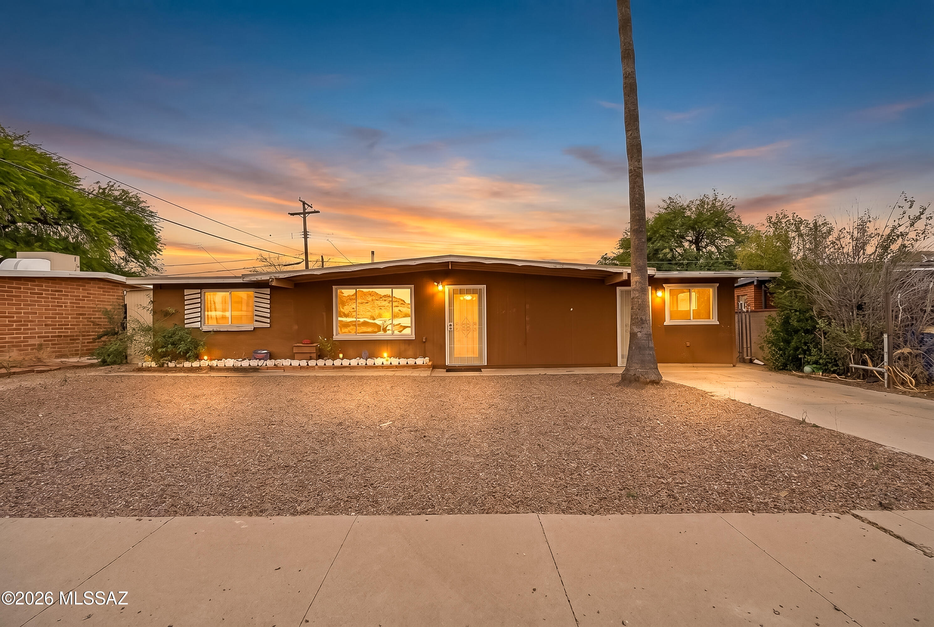 This inviting 3-bedroom, 2-bath home offers a spacious and functional layout with room to make it truly your own. The heart of the home is a generously sized kitchen, perfect for cooking, gathering, and entertaining, while the comfortable living area provides a relaxed space to unwind.

Each of the three bedrooms offers ample space and flexibility for family, guests, or a home office. Durable concrete flooring throughout adds a modern, low-maintenance touch and a clean aesthetic.

Step outside to a large backyard with plenty of room for outdoor living, gardening, or future enhancements.

This home presents a fantastic opportunity for buyers looking to add their personal style and value over time. With great bones and plenty of potential, it's the perfect canvas to create something sp