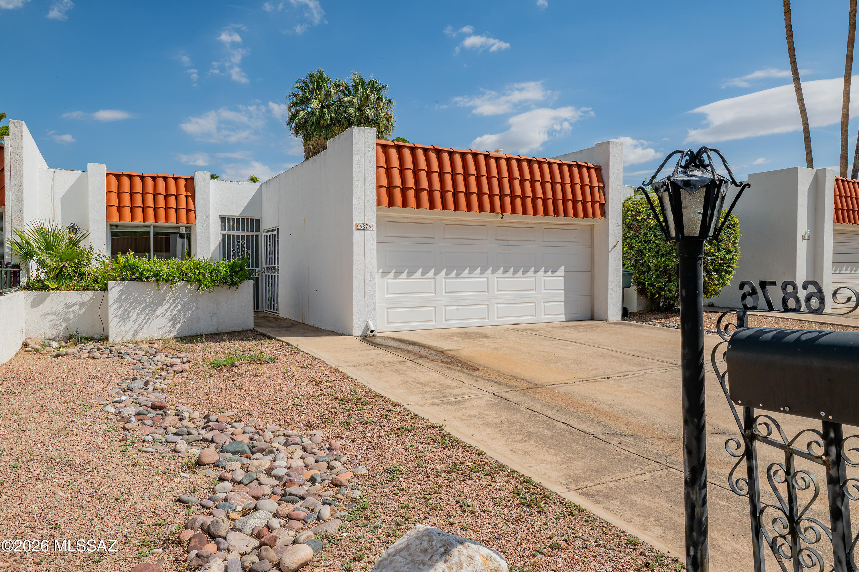 This golf course home is right on the green of the 5th hole of the Dorado Golf Course. Watch folks sink birdies from a comfortable 30 yards away and enjoy the smell of the green grass and beautiful trees surrounding your back yard oasis. Your back patio is grass landscaped and has citrus trees, lantana, and large shade trees that keep you cool in the Summer and Spring. The large patio has a small hot tub an a very wide sliding glass door that provides a view of the golf action all season long.  The home itself has been remodeled to the embrace of a modern, open, floor plan making it head and shoulders above the rest of the properties that have sold over the years. New carpet, stainless steel conduction oven, and granite kitchen countertops are also amenities you'll love in this home.