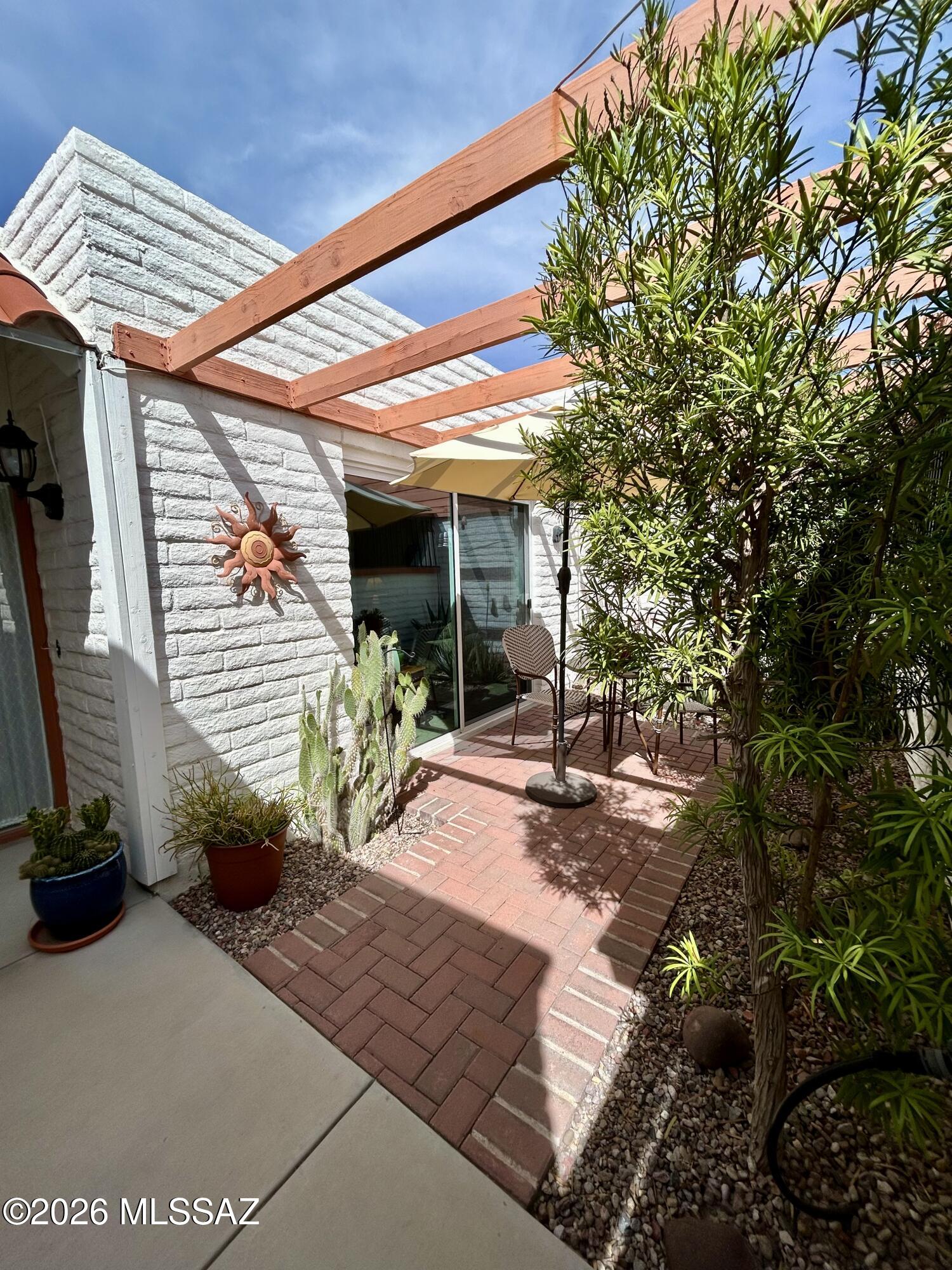 Located in the desirable Tierra De Vida subdivision, this beautifully updated 2-bedroom, 2-bath townhome at 2009 N Calle De Vida offers the perfect blend of comfort, style, and convenience.

Step inside to discover a thoughtfully refreshed interior featuring modern finishes, an open and inviting floor plan, and abundant natural light throughout. The spacious living and dining areas flow seamlessly, creating an ideal space for both relaxing and entertaining.

The kitchen showcases contemporary touches with ample cabinetry and workspace, while both bedrooms are generously sized--each offering privacy and comfort, including a well-appointed primary suite with its own bath.

Enjoy Arizona living with private outdoor space perfect for morning coffee or evening unwinding. Additional highlights include in-unit laundry, covered parking, and low-maintenance living.

Situated in a quiet, established community, residents of Tierra De Vida enjoy access to amenities such as a pool, clubhouse, and landscaped grounds, all within close proximity to shopping, dining, and everyday conveniences in Tucson.

Whether you're looking for a full-time residence, seasonal retreat, or investment opportunity, this move-in-ready townhome delivers exceptional value in a prime Tucson location.