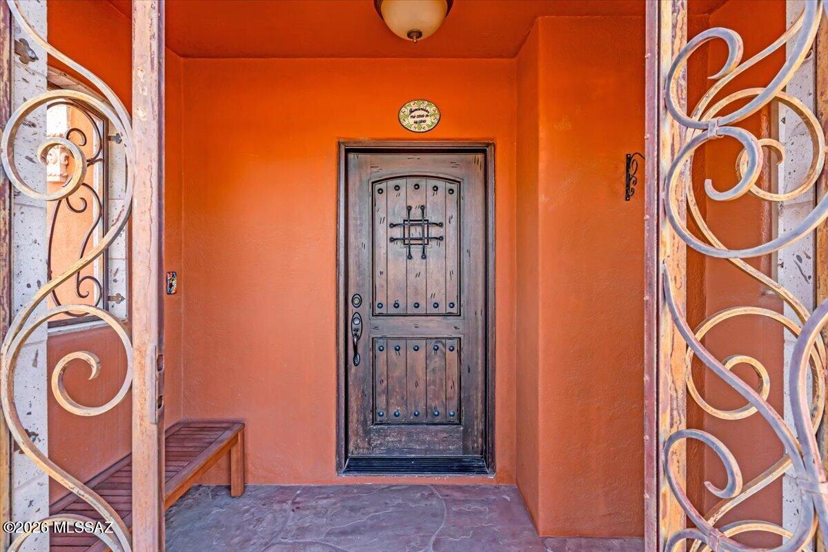 Back on market with a refreshed price--motivated seller says bring an offer! Lowest $/SqFt in the area! This unique central Tucson home near Poets Square offers a flexible layout with a private entrance ideal for guests, a home office, multigenerational living, or potential rental use. Full of Tucson character, enjoy custom woodwork, high ceilings, and abundant natural light throughout. Spacious living areas and a functional kitchen with stainless steel appliances make everyday living and entertaining easy. The primary suite features a jetted tub and walk-in closet. Valuable updates include triple-pane windows, newer roof (2022), and AC replaced in 2013 with preventative maintenance completed every 6 months. No HOA and a rare opportunity to own a home with flexibility, charm, & character.
