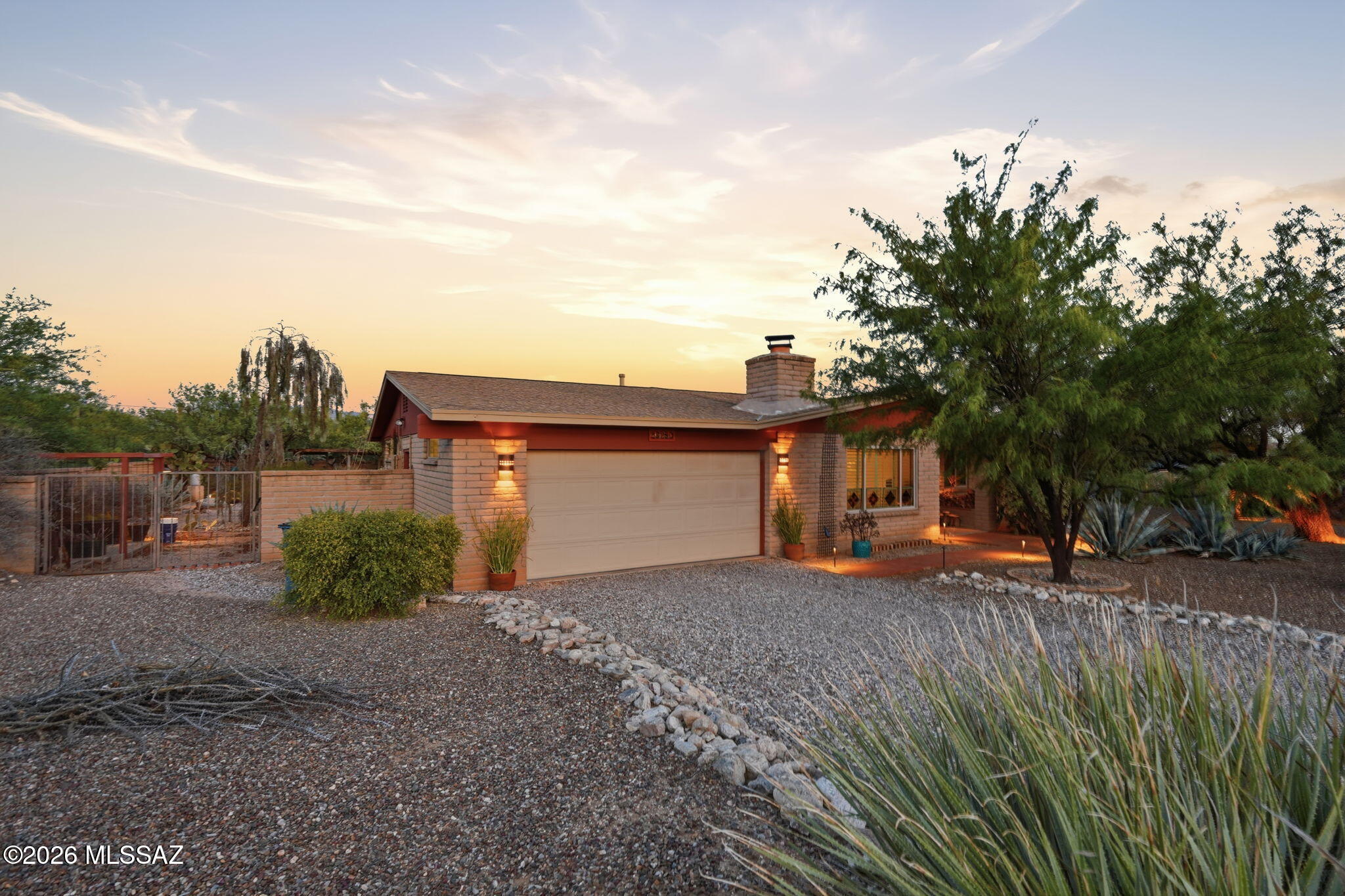 Nestled on a quiet, saguaro studded corner lot is this beautifully maintained home with mountain views from the front and back.  Updated kitchen and baths blend style and functionality. 3BR/2BA floor plan offers formal dining,  family room off the kitchen, and separate living room. Plantation shutters & ceiling fans thru-out. Step outside to a fully enclosed backyard retreat featuring a charming covered patio, ramada, beach-entry pool with seating and water feature, plus ample space for pets and gardening. Designed for both relaxation and entertaining, exceptional outdoor living area offers complete privacy, mature vegetation, and spectacular sunsets. NO carpet, NO HOA and OWNED solar provide added value and efficiency. Pre-listing home inspection is available for added buyer confidence.