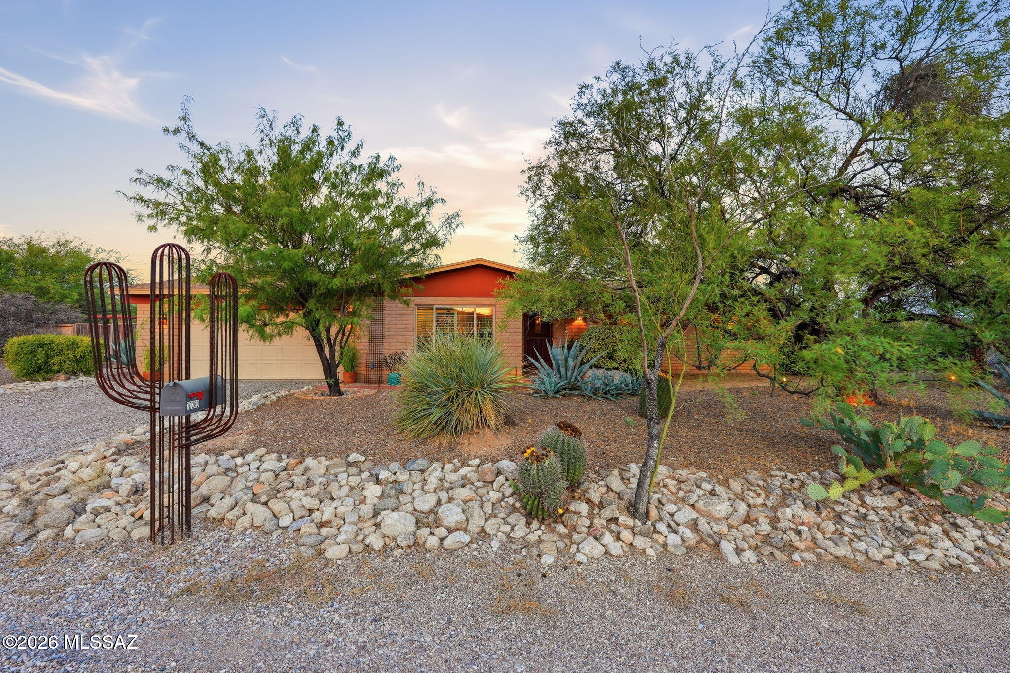 Nestled on a quiet, saguaro studded corner lot is this beautifully maintained home with mountain views from the front and back.  Updated kitchen and baths blend style and functionality. 3BR/2BA floor plan offers formal dining,  family room off the kitchen, and separate living room. Plantation shutters & ceiling fans thru-out. Step outside to a fully enclosed backyard retreat featuring a charming covered patio, ramada, beach-entry pool with seating and water feature, plus ample space for pets and gardening. Designed for both relaxation and entertaining, exceptional outdoor living area offers complete privacy, mature vegetation, and spectacular sunsets. NO carpet, NO HOA and OWNED solar provide added value and efficiency. Pre-listing home inspection is available for added buyer confidence.