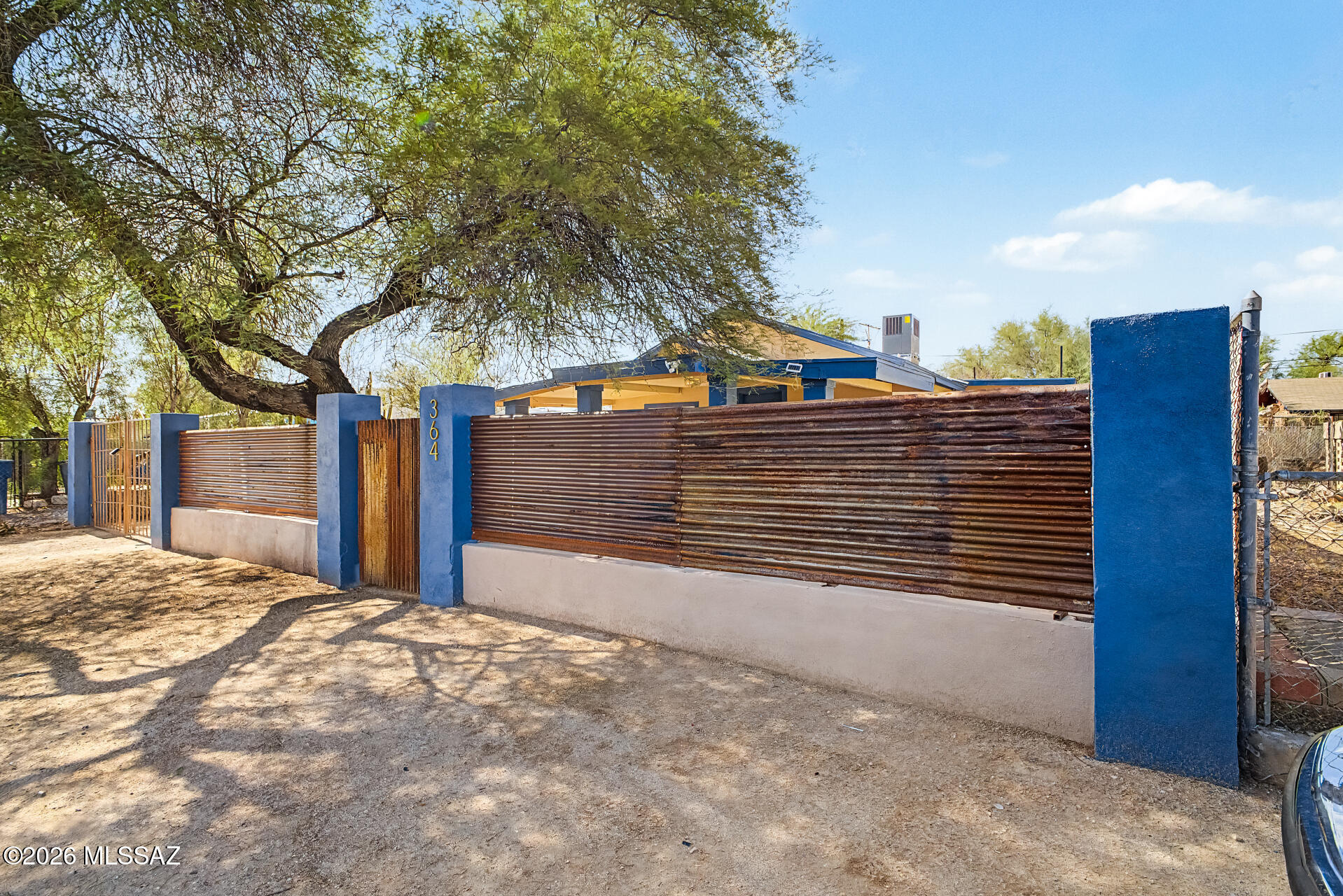 Take advantage of this fantastic opportunity! This charming bungalow has an additional 200 sq ft unit that can be converted into another living space! Discover an inviting front yard with a large covered patio. Enter into a completely remodeled light-filled living space with a soothing palette and durable tile flooring for easy maintenance. The updated kitchen features a breakfast bar, granite countertops, a custom tile backsplash, and sleek SS appliances. You'll love the thoughtful modern touches throughout, new dual-pane windows, freshly painted interior and exterior, ceiling fans, new HVAC system, and upgraded electrical panel. The private driveway can accommodate multiple cars for secure parking. Unwind in the spacious backyard offering tons of space for outdoor relaxation. Agent/Owner