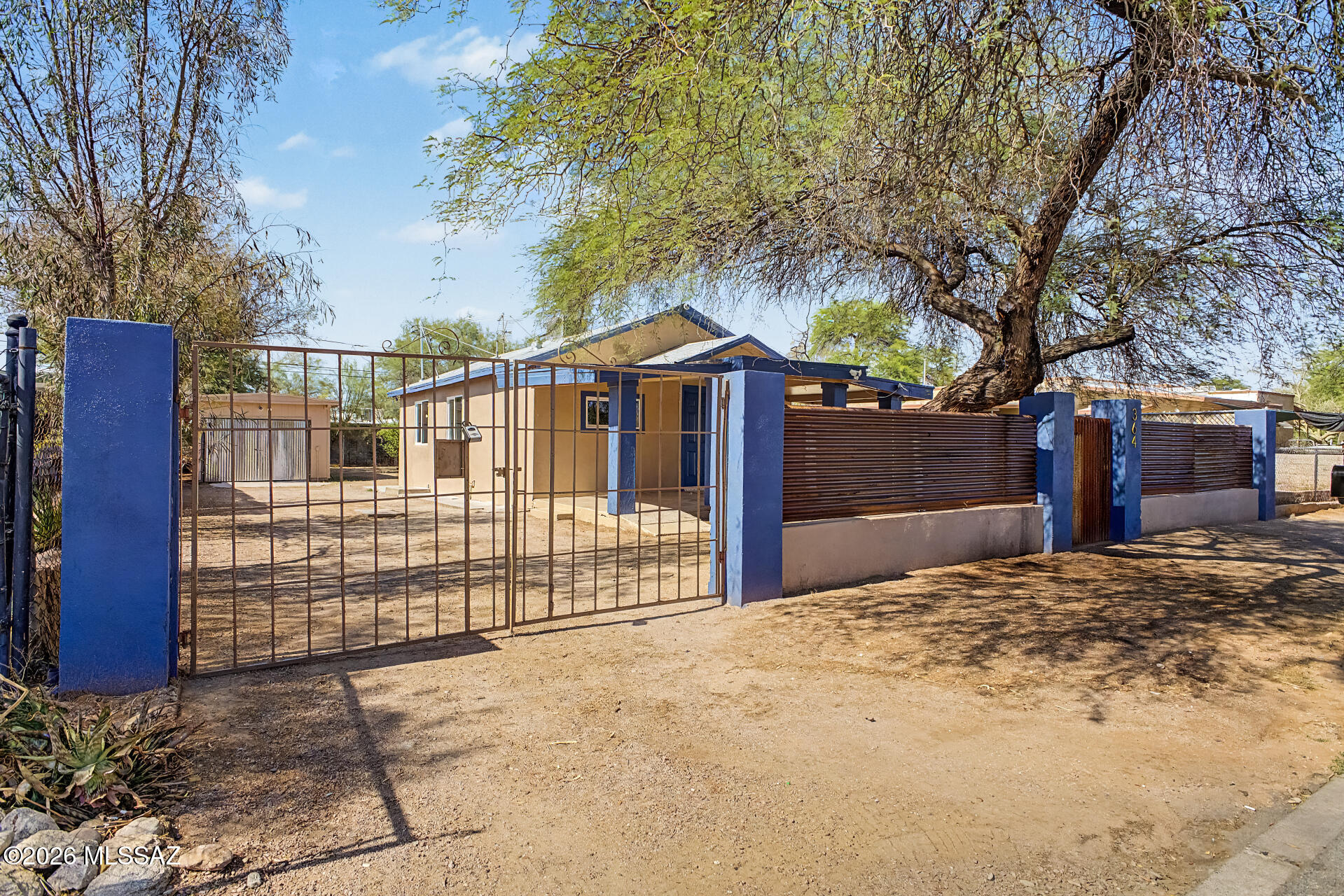 Take advantage of this fantastic opportunity! This charming bungalow has an additional 200 sq ft unit that can be converted into another living space! Discover an inviting front yard with a large covered patio. Enter into a completely remodeled light-filled living space with a soothing palette and durable tile flooring for easy maintenance. The updated kitchen features a breakfast bar, granite countertops, a custom tile backsplash, and sleek SS appliances. You'll love the thoughtful modern touches throughout, new dual-pane windows, freshly painted interior and exterior, ceiling fans, new HVAC system, and upgraded electrical panel. The private driveway can accommodate multiple cars for secure parking. Unwind in the spacious backyard offering tons of space for outdoor relaxation. Agent/Owner