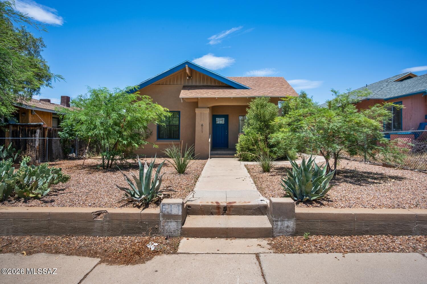 Step into timeless charm with this beautifully maintained 3-bedroom, 2-bath historic home, ideally located just minutes from the University of Arizona. Rich in character, this inviting residence showcases classic architectural details, warm hardwood floors, and abundant natural light, while offering the comfort and functionality of modern living.

The spacious floor plan features generously sized bedrooms, two updated bathrooms, and welcoming living spaces perfect for relaxing or entertaining. The kitchen blends historic appeal with everyday convenience and the interior and exterior has been freshly painted.

Whether you're looking for a primary residence, a game-day retreat, or an investment opportunity, this home's unbeatable location is it!