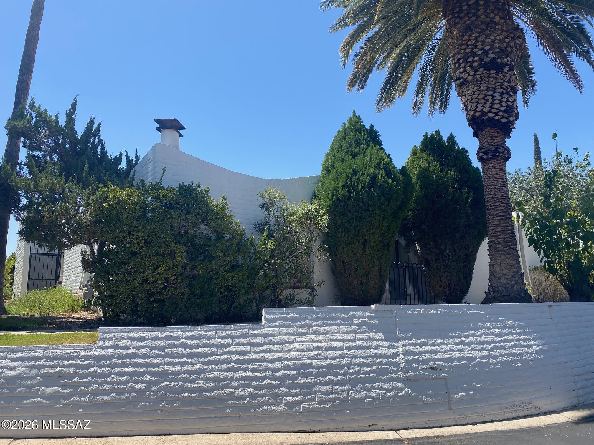 Well cared for 2 bedroom/2 bath townhome in 55+community. Saltillo tile throughout. Custom wood shutters, gas fireplace. Front and rear courtyards. One covered parking spot. Pets upon owner approval.