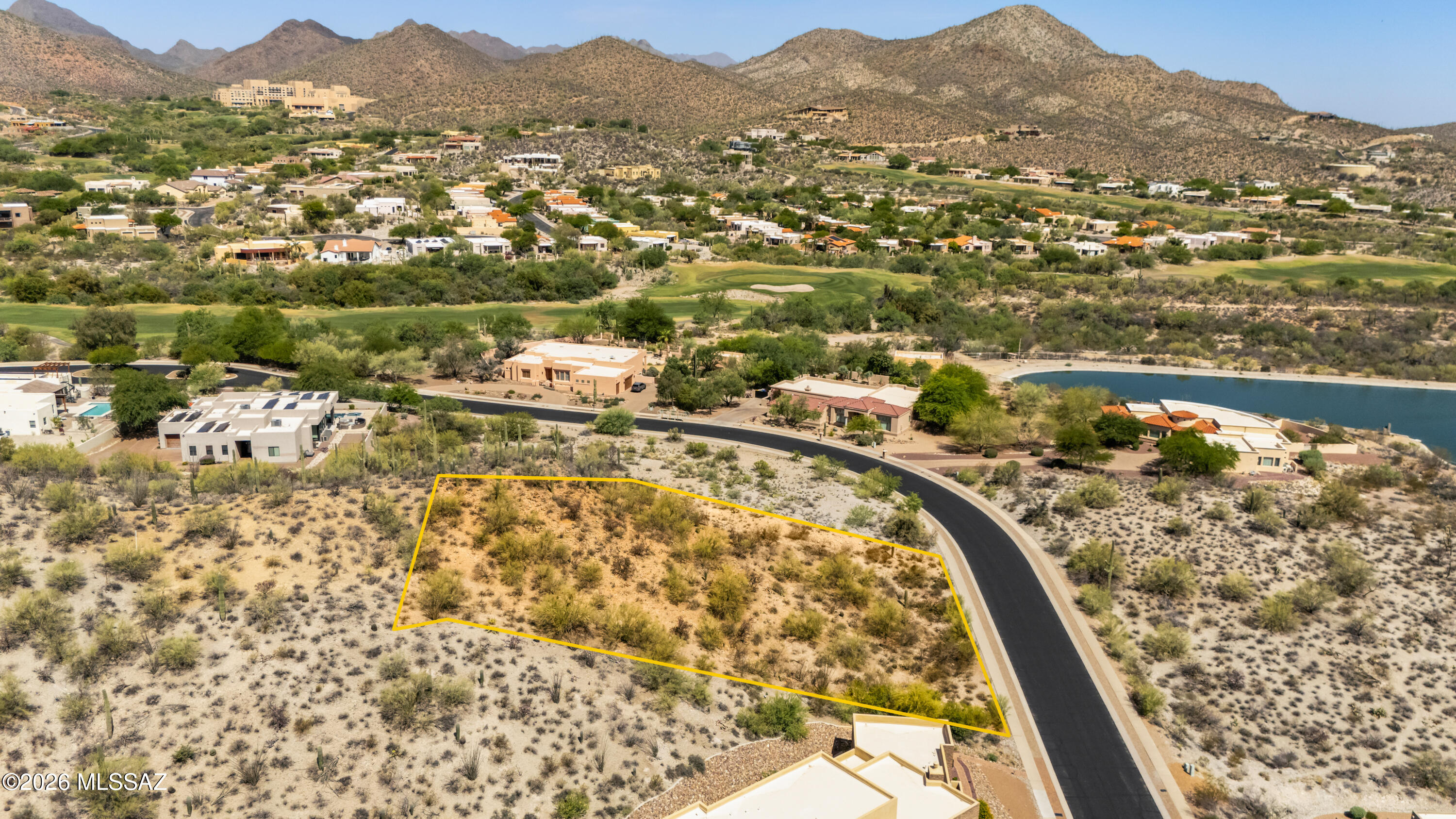 Build your dream home in the prestigious gated community of Coyote Pass, nestled within the highly sought-after Starr Pass Master Planned Community in Tucson's scenic west side. This exceptional homesite offers a rare opportunity to create a custom residence surrounded by breathtaking Sonoran Desert beauty, dramatic mountain views, and city-light views. Coyote Pass features spacious estate-sized lots, luxury custom homes, and a tranquil setting that blends privacy with convenience. Residents enjoy easy access to world-class golf, resort amenities, hiking and biking trails, downtown Tucson, and the renowned JW Marriott Starr Pass Resort & Spa. Utilities are available at lot line, making this an ideal canvas for your custom vision. Experience the perfect balance of natural beauty, upscale living, and an unbeatable location in one of Tucson's premier master-planned communities.