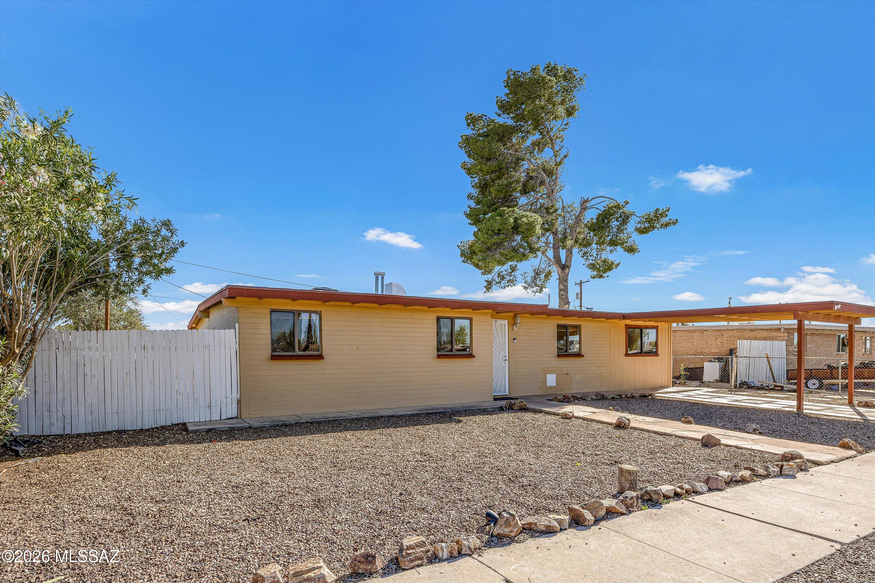 Range Pricing. Seller will accept or counter offers between $284,900-$290,000. Discover the perfect blend of space, flexibility, and comfort in this well-maintained Eastside Tucson home. Offering 3 bedrooms, 2 bathrooms, and a versatile floor plan with potential for a 4th bedroom, this home is ideal for growing households, remote work, guests, or additional living space tailored to your needs. Inside, you'll find an open-concept layout filled with natural light and designed for easy everyday living and entertaining. The updated kitchen features stainless-steel appliances, abundant counter space, and a functional flow into the dining and living areas. Thoughtful updates add both value and peace of mind, including fresh interior paint, a newly recoated roof (3/2026), newer HVAC system and and hot water heater, plus a 1-year home warranty for added confidence. Step outside to a generously sized backyard with room to garden, entertain, play, or simply relax. A storage shed provides extra space for tools, hobbies, and seasonal items. Conveniently located on Tucson's sought-after Eastside, this move-in ready home offers comfort, flexibility, and opportunity all in one. Come see it today!