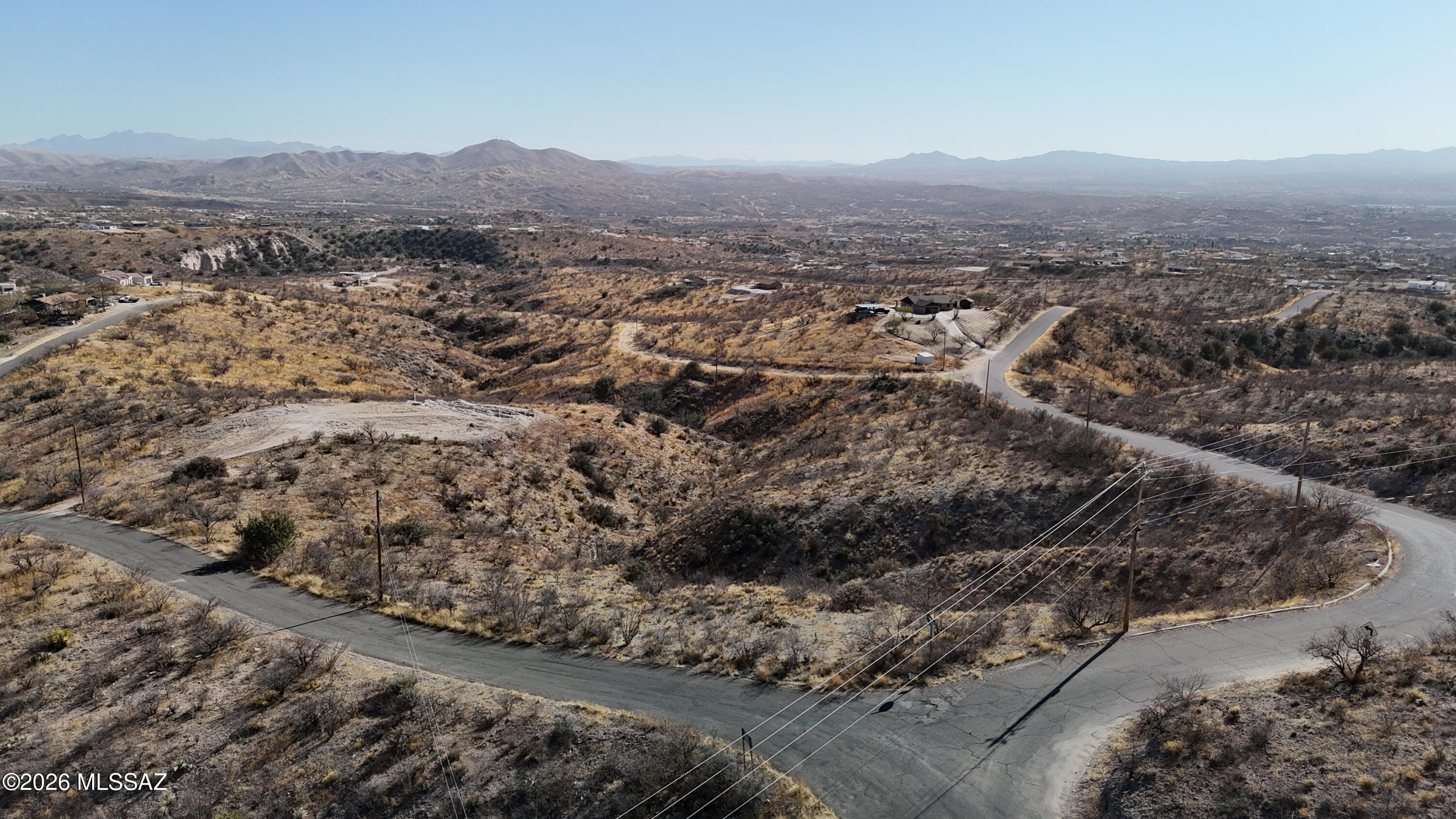 Close to Paseo Mexico and Paseo Matamoros.
Lot has some rolling terrain.  Electric poles at the street.  Water verification has been sent to the water co.  I will upload that into Documents once received back.  All paved roads.