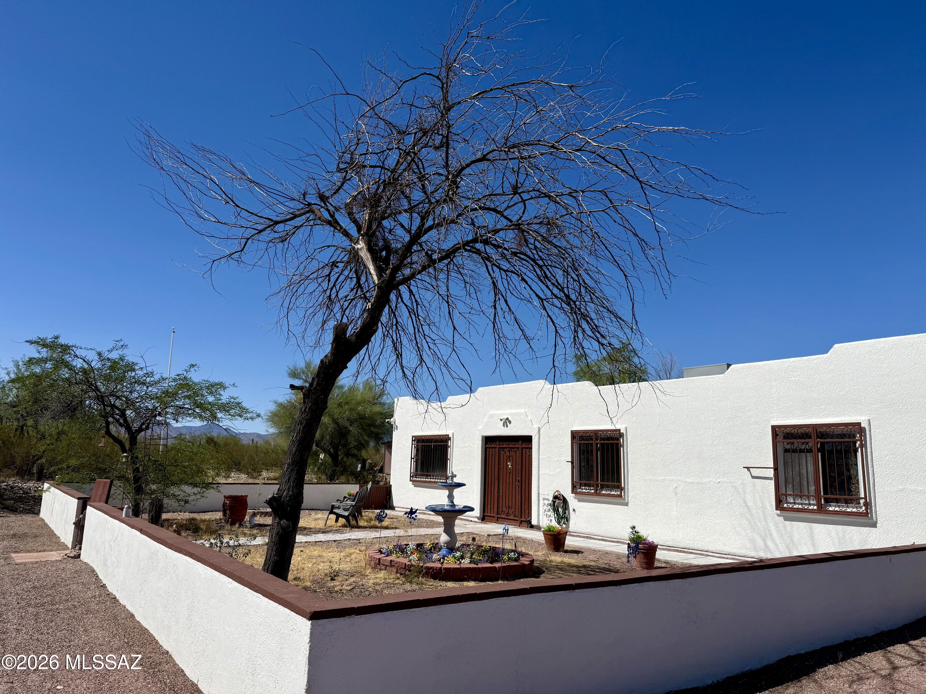 Photos coming! Discover the perfect blend of comfort and country living with this charming 3-bedroom, 2-bath home situated on 4.16 acres of horse property with breathtaking panoramic mountain views. Inside, you'll find an updated kitchen featuring granite countertops.

Enjoy year-round relaxation in the Arizona room or unwind in the private courtyard, ideal for morning coffee or evening sunsets. The fenced backyard provides a secure space for pets, play, or gardening while still offering plenty of room to enjoy the surrounding desert landscape.

With over four acres of usable land, this property offers endless possibilities for horses, outdoor recreation, or creating your dream ranch setup. Whether you're looking for peaceful country living, room to roam, or spectacular Arizona sunsets This property delivers it all.