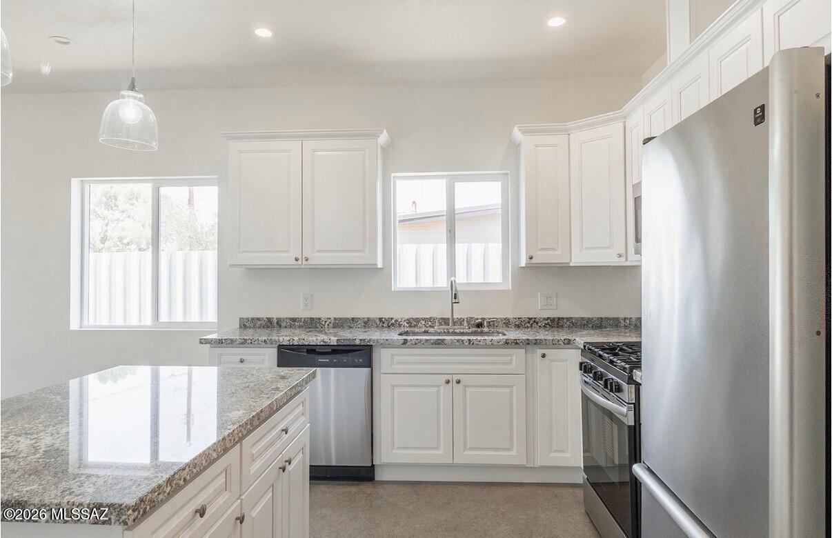 Brand new construction centrally located, less than 10 minutes to the University of Arizona and located near McCormick Park/YMCA. Features an open concept living room/kitchen, high end finishes including granite and concrete polished modern floors, soft close cabinets, kitchen island, double sinks in both of the super large bathroom, huge laundry with lots of storage and walk-in closet in primary suite. 

Refundable Deposit is $1700. 

Please complete the application prior to requesting a viewing.  Landlord requires 660 or better credit, 2.5x rent income and 2 years landlord references.

No smoking residence. Pet friendly with pet deposit.

Renter pays all utilities and responsible for keeping property in good condition assuming normal wear and tear.