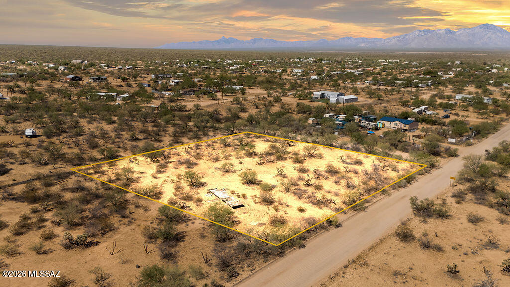 Buildable flat lot that offers freedom to live how you like. No HOA and only 30 minutes to the conveniences and shopping of Tucson. Three Points offers numerous conveniences such as the Three Points General Store, Ace Hardware, Chevron Gas Station, an Animal Feed Store, Tire Shop and more. There is also a public park nearby with a playground, large grass field along with basketball courts and a baseball field. Enjoy the peace and quiet of country living while enjoying spectacular sunsets and star gazing all at a great price!