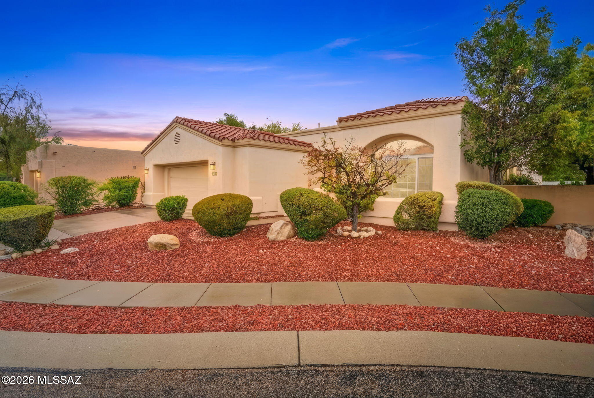 Rare opportunity in desirable Shadow View Estates. This single-story home sits on a quiet cul-de-sac and offers a functional 3-bedroom, 2-bath floor plan with no interior steps and hard surface flooring throughout. The spacious backyard is a standout, featuring low-maintenance turf, mature citrus trees, and ample room to relax or entertain. A charming front courtyard adds curb appeal and privacy. Centrally located with convenient access to shopping, dining, and major routes. Includes a newer 2020 HVAC. Poly Pipes replaced with Pex in Nov 2019. Excellent layout, great lot, and a chance to personalize in one of Tucson's most sought-after, quaint neighborhoods.