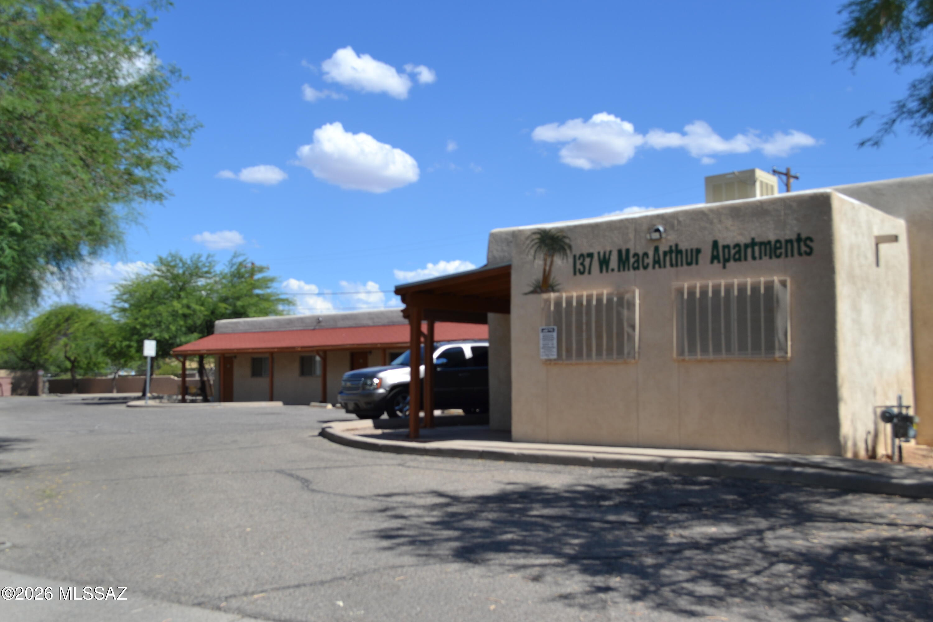 Tucked away, spacious 2 bedroom, 1 bath, a/c,  small enclosed backyard, 1 parking space in front of unit, and 1 other to side of property, laundry facility, Must carry Renters Insurance