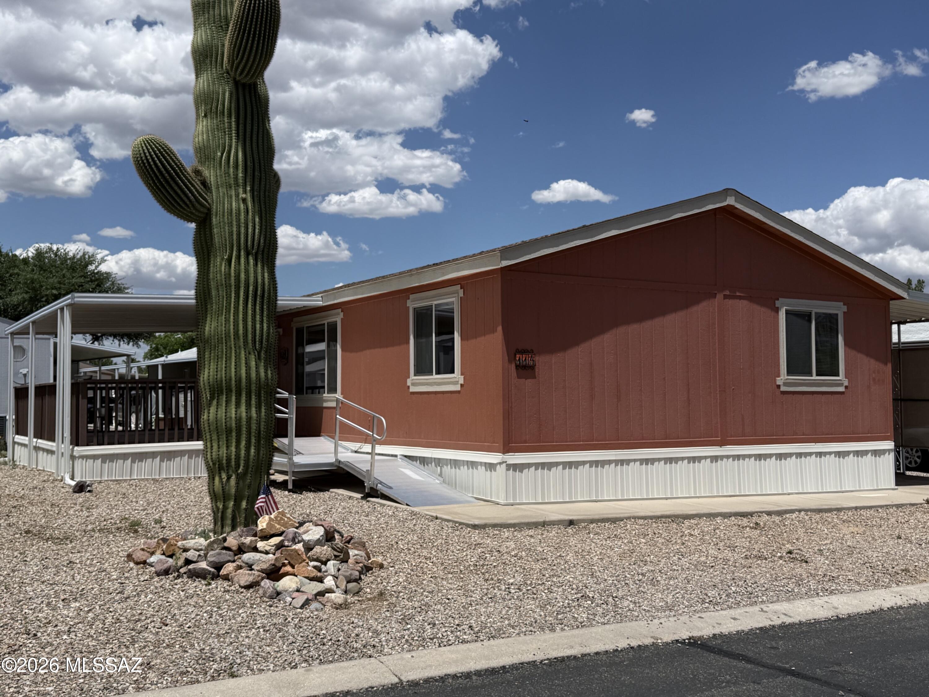 Move right in to this tastefully renovated 3BR/2BA home in the desirable 55+ San Pedro RV Resort. Upgrades include luxury vinyl plank floors in the living areas, new dishwasher, new water heater, new fully remodeled wheelchair accessible bathroom with roll-in shower, sink and a lighted commode with a heated seat. Large 12' x 22' covered deck with wheelchair ramp expands your living space outdoors; attached tandem 2-car carport provides covered parking and extra storage. The pet-friendly resort lifestyle features indoor & outdoor pools, pickle ball, library, clubhouse, rec center and organized activities. Perfect for active adults seeking low-maintenance, turnkey living.
