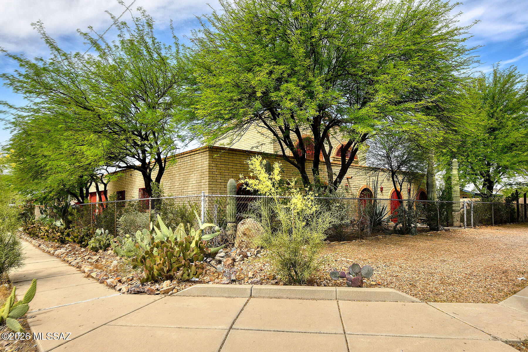 INCREDIBLE OPPORTUNITY!!! Over 4700 SQFT of ''In-Town'' Living Space!  Just under ¼ ACRE LOT, 6 Bedrooms, 3.5 Baths, and a 2 Car Garage at a FANTASTIC PRICE!  SOLID Masonry Construction LESS than 2 Miles to Downtown and 3.5 Miles to the University of Arizona!  Experience the ''Pinnacle of Modern'' living in this Multi-Generational home with a COMPLETELY UPDATED CASITA featuring an Independent Entrance, FULL Kitchen, Bedroom, Bath, and Living Space.  In the Main Home you'll find, a Split Plan with 5 Bedrooms, 2.5 Baths, a LARGE Family sized Kitchen, Dining Room, Great Room, Laundry Room, Hard Flooring throughout, TWO Cozy Gas Fireplaces, and a Bonus FINISHED BASEMENT!  At Just UNDER $95 a SQFT, this one could also be PERFECT for an INVESTOR.  And, the Roof was JUST Recoated!  Welcome Home!