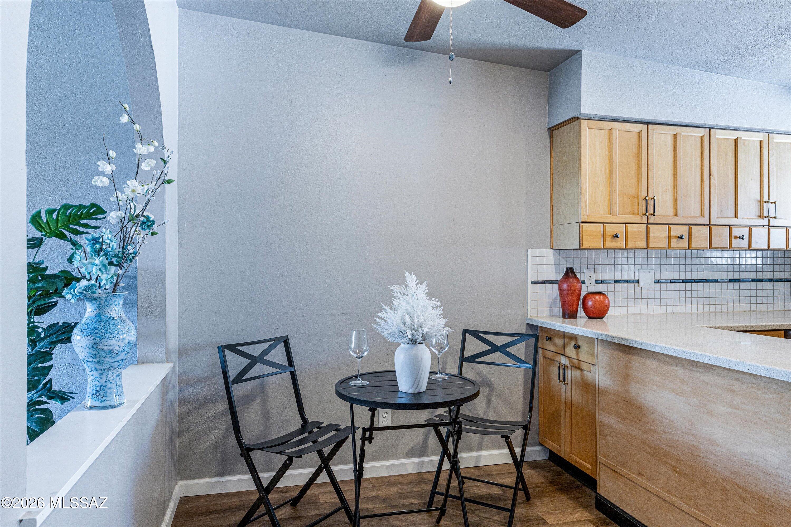 MOTIVATED SELLERS!!  Small, Boutique Neighborhood in the heart of Central Tucson.  Fabulous location, convenient to U of A, TMC, many medical facilities, The Loop, and Winterhaven Christmas Lights Event!   Updated townhome with cheerful ambiance.  Open floorplan, lots of natural light, large bedrooms and 2 baths.  Kitchen with ample counter space and cabinets are abundant.  Recessed lighting is a plus. NO CARPET!  Wood plank laminate throughout.  Carport is on East side and is shaded the majority of the day.  Large back patio perfect for entertaining and a pull down sun shade for privacy and comfort.  Newer HVAC unit and hot water heater.  Please consider using Pamela M Baker, Producing Regional Manager, On Q Home Loans.  (480) 444-7128