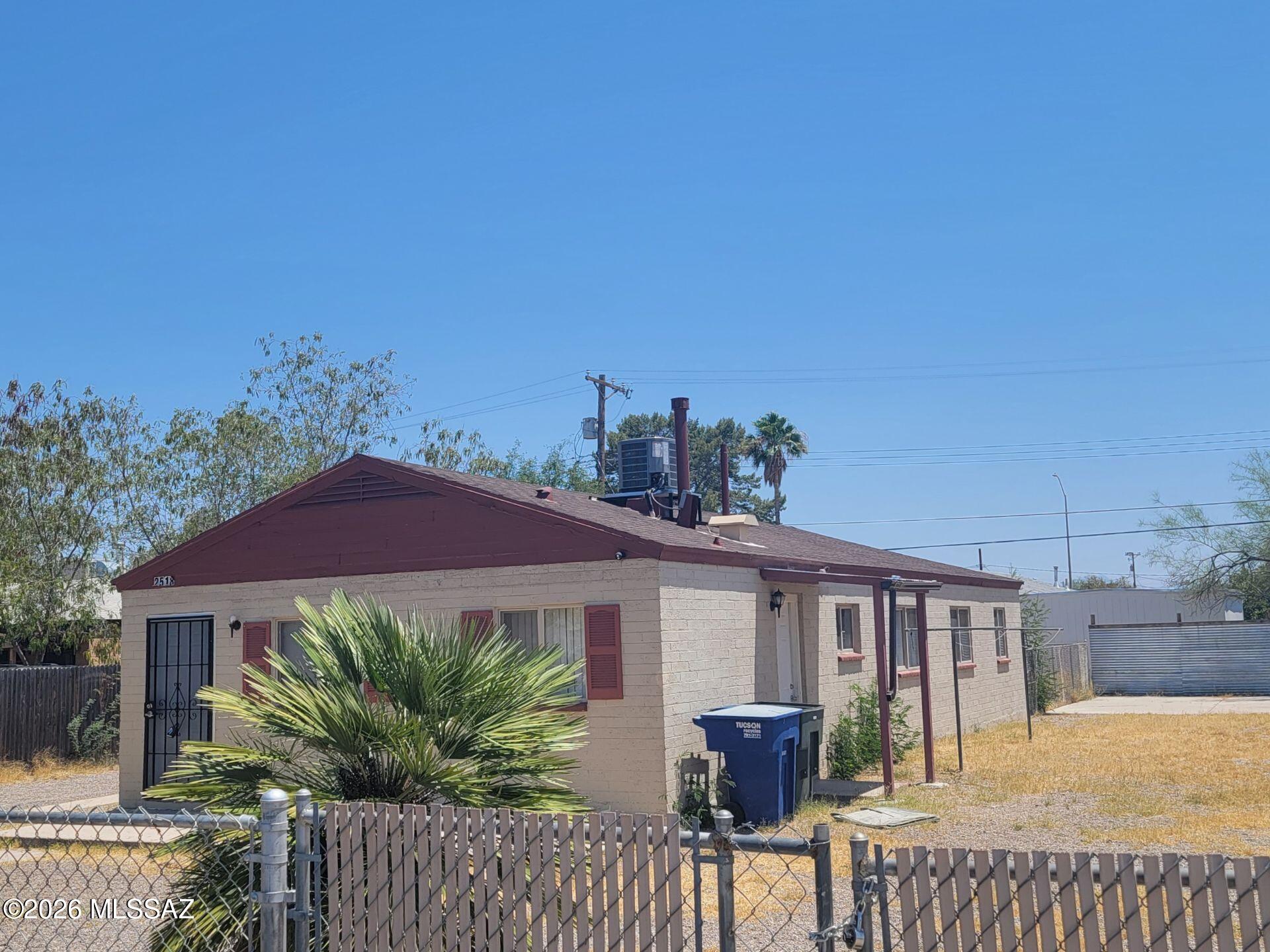 Investment opportunity in central Tucson! This charming duplex offers 5 total bedrooms, 2 bathrooms, and approximately 1,695 sq. ft. on a spacious 7,453 sq. ft. lot. Built in 1952 and thoughtfully updated, it combines classic character with modern finishes. Unit 1 features 3 bedrooms, 1 bathroom, an updated kitchen, wood-style flooring, abundant natural light, and a private yard. Unit 2 offers 2 bedrooms, 1 bathroom, an updated kitchen, generous living space, and a private yard. Both units are currently occupied, offering immediate income potential. Please do not disturb tenants. Showings are by appointment only and require proper tenant notice. Contact the listing agent for details.