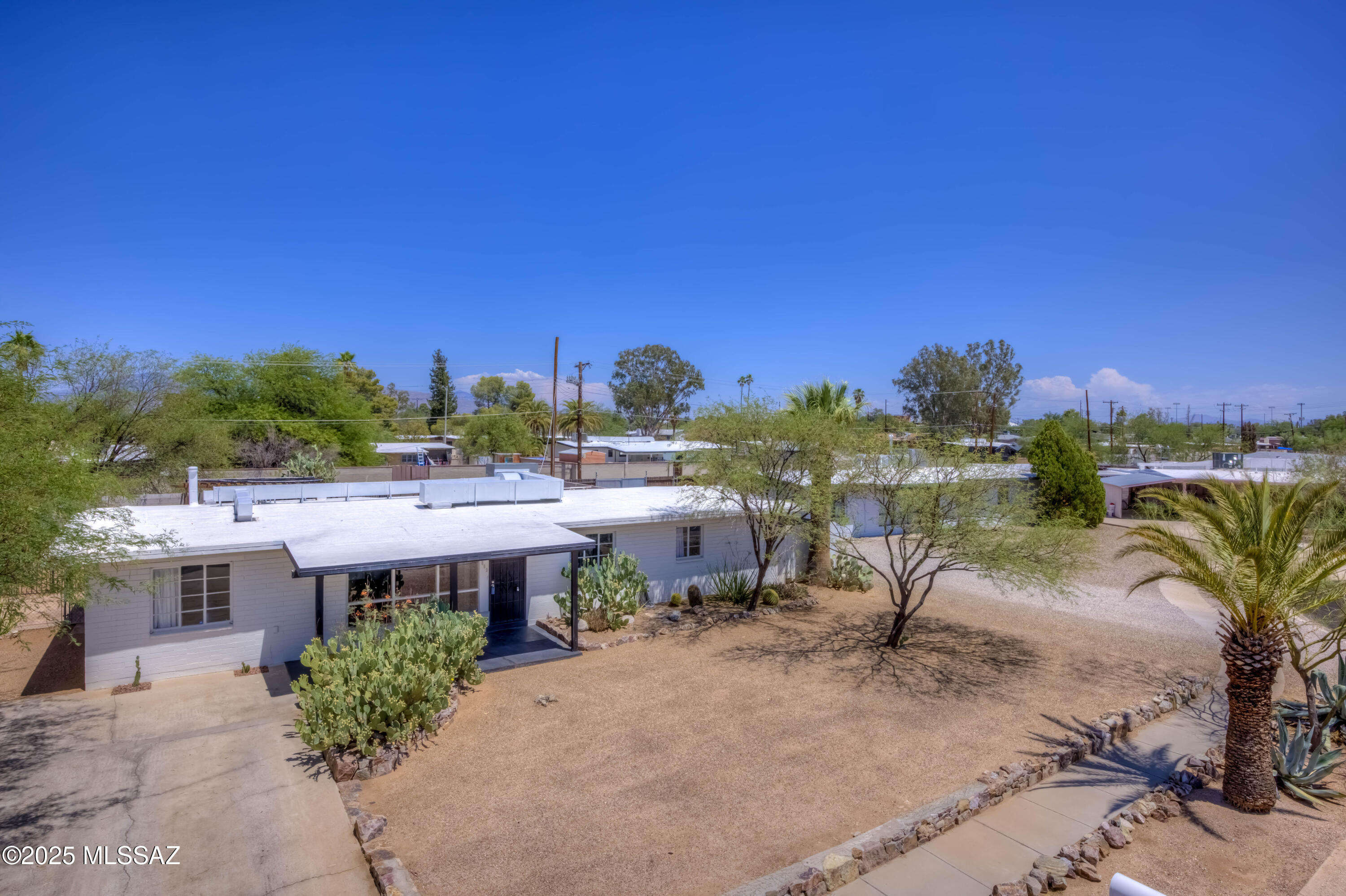 Beautiful updated and recently remodeled home in East Tucson with sparkling pool! The best home in Yale Estates that has been listed in years! 3 bedrooms that could easily be 4 bedrooms that is updated, upgraded and in prestine shape.  A must see!