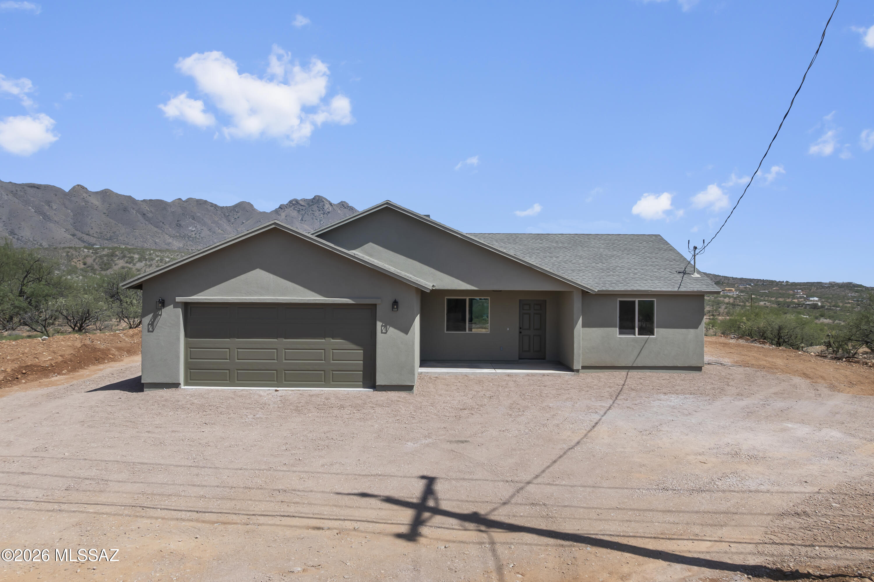 Brand Bew Construction located in a very nice area with Great Views.
Open floor plan and split bedroom areas
3 bedrooms 2 bathrooms ceramic floors and 
good size bedrooms 
Covered Patio to enjoy the Arizona Sunsets and Sunrises
Living area 1513 sq ft
Garage 479 sq ft
Covered Patio 329 sq ft
