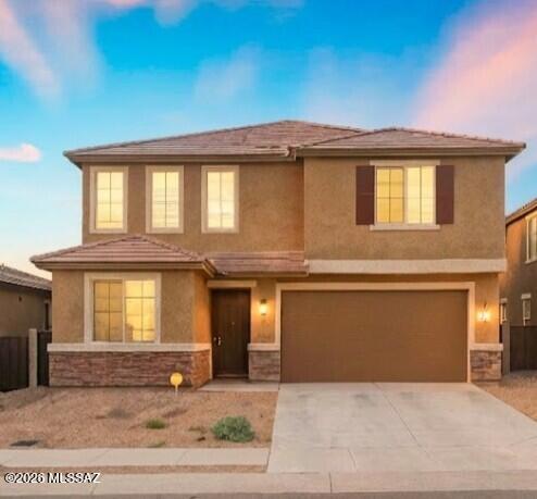 Welcome home to your spacious 2,633' Richmond American home built in 2022 in Vail Schools backing to The Loop and open space with mountain views. With 5 bedrooms, 3 bathrooms, and an upstairs loft, you can spread out with plenty of flexible space. The main floor features a large great room with an upscale, open kitchen with granite countertops, upgraded cabinets with tile backsplash, large island, gas range, walk-in pantry, and under stairs storage. Off the foyer is a bedroom and half bathroom perfect for an office or guest space. At the top of the stairs is a generous-sized loft space and four bedrooms, including the primary retreat with a large walk-in closet and fully tiled shower. Owner related to agent. The large backyard has a covered, cool-decked patio with mature landscaping and mountain views. The extended-length garage gives you extra room for larger vehicles. This beautiful, thoughtfully upgraded home is move-in ready for you. Located in the highly desirable La Estancia community where you will love the great selection of schools available within the sought after Vail School District. La Estancia has direct access to 'The Loop', an interconnected system of more than 130 miles of paved pathways and bike lanes, as well as two community pools, splash-pad, basketball court, pickleball courts, playgrounds, and more than 8 beautiful parks. La Estancia is within close proximity to many major employers, including Davis-Monthan AFB, Tucson International Airport, UA Tech Park, Raytheon and Amazon. Reach out for your private look of this stunning upgraded home today!