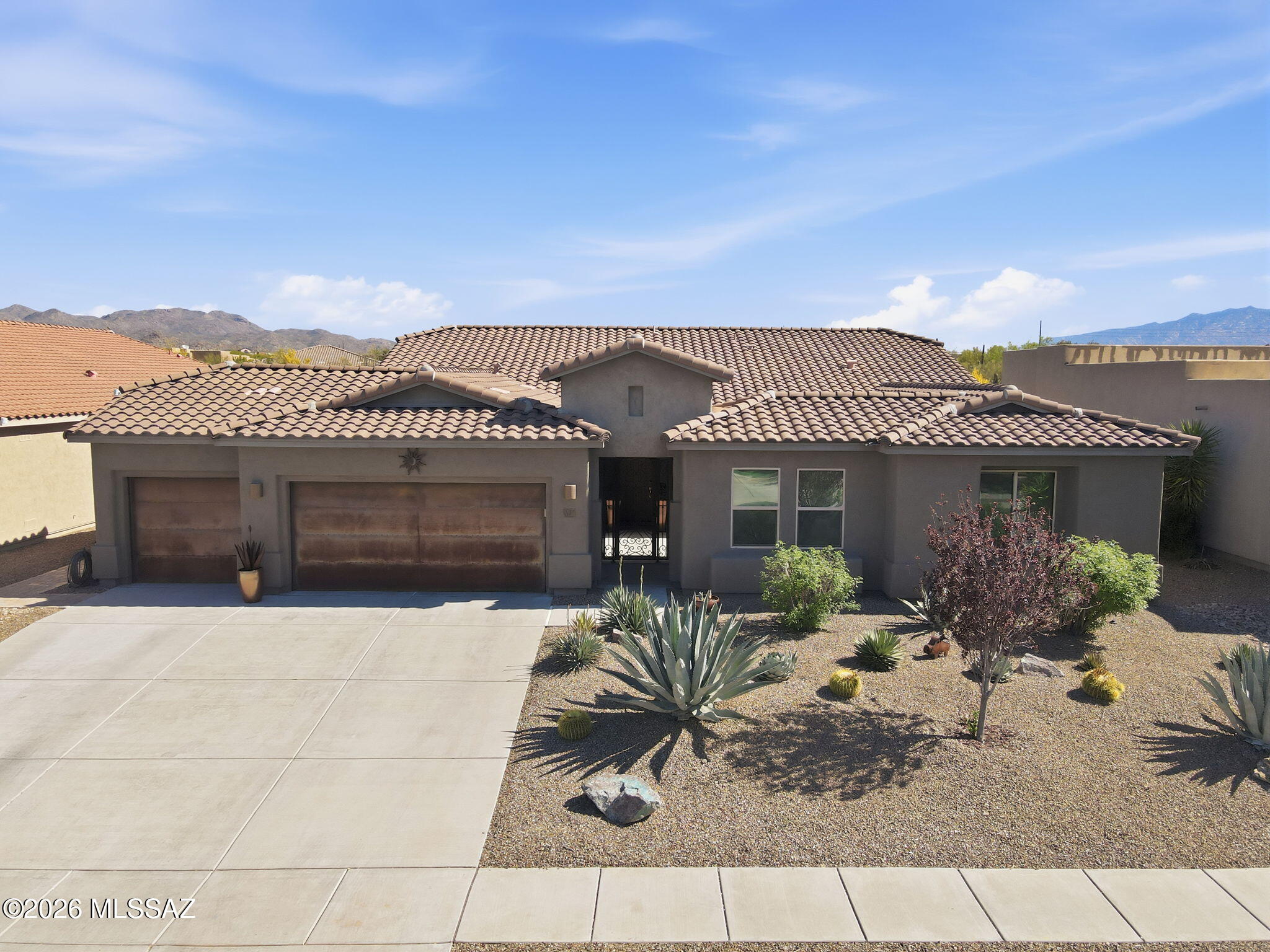 Located in the gated community of Sky Ranch Estates, this beautifully maintained 2,778 sq ft home features 4 bedrooms 2.5 baths a dedicated office/den, and a versatile bonus/teen room--offering the perfect blend of privacy and space. A rare 4-car garage provides exceptional room for vehicles, toys, or hobbies without compromising style. Inside, enjoy an open, thoughtfully designed floor plan with a split-bedroom layout, creating a private primary retreat. The backyard backs to a protected desert preserve and showcases a sparkling pool with a tranquil waterfall--Arizona living at its finest.  Agent/Owner